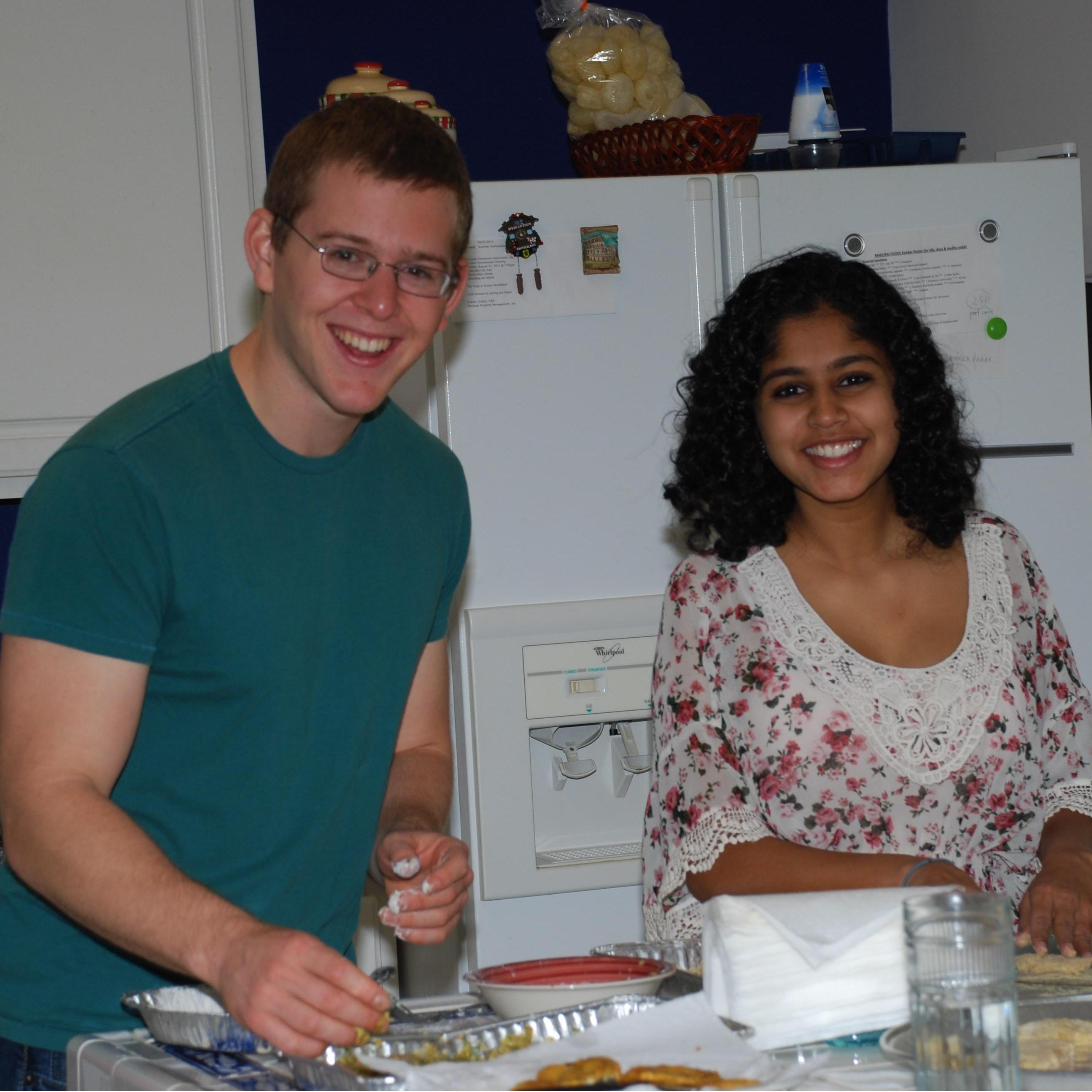 Debika's parents' kitchen, Alpharetta, Nov 2011. Making fish fry with Debika's parents' during their first meeting. Bikash was hand-feeding Scott fish fry within about 30 minutes of meeting him.