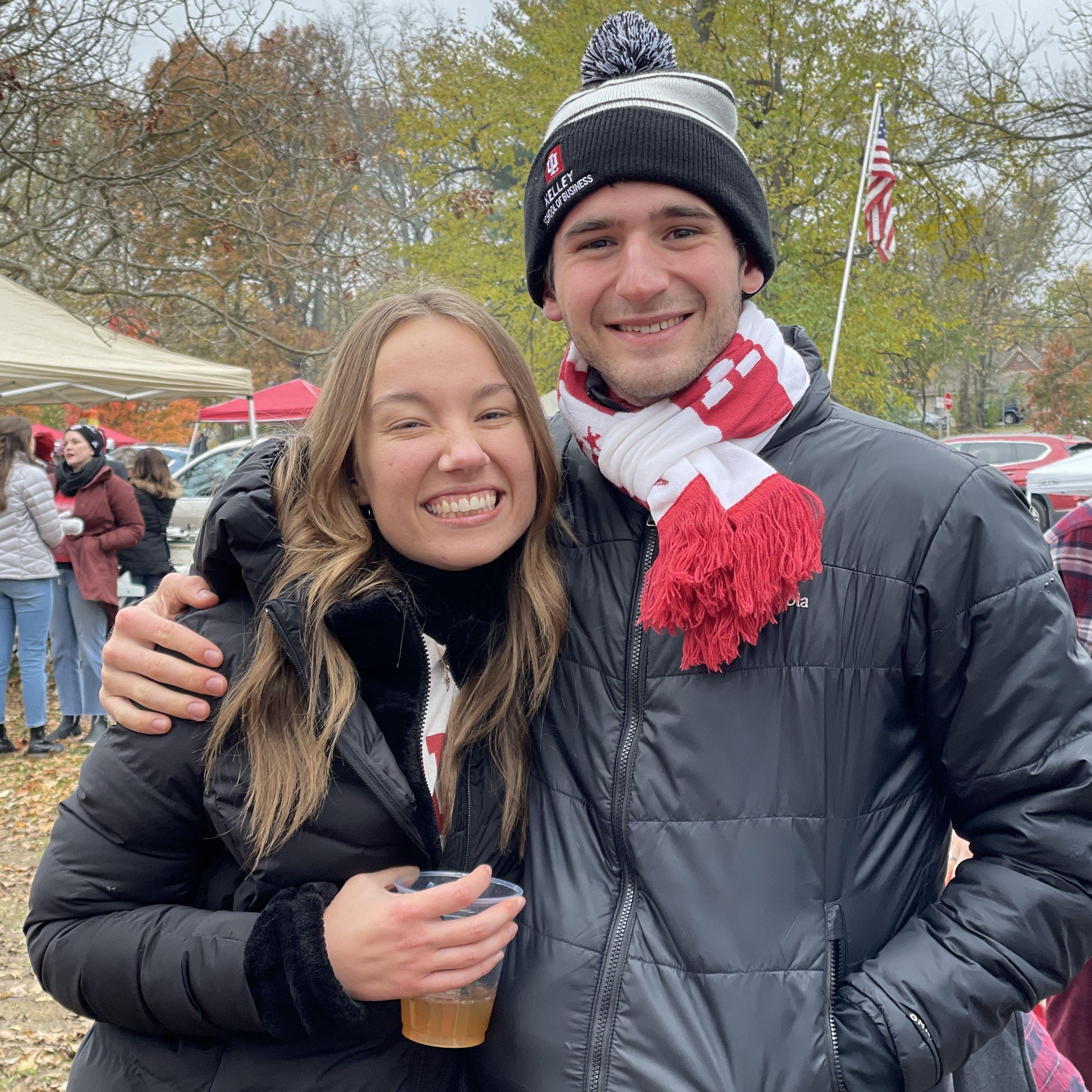 The day after our first date, Nathan casually invited Carly to park next to Nathan and his family at a tailgate... So she said yes, and both families met just after our first date.