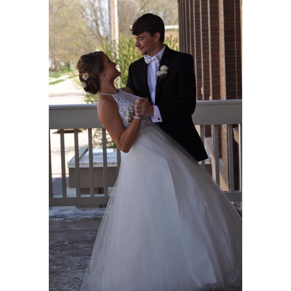 Junior year prom. Pedestrians thought we were getting married