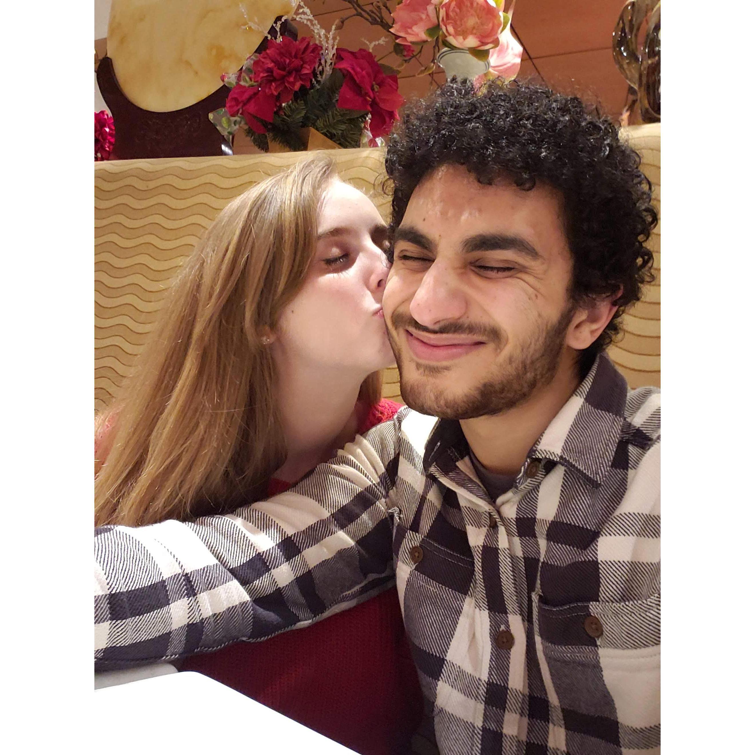 Sweet cheek kisses on our final date night as an unmarried couple!