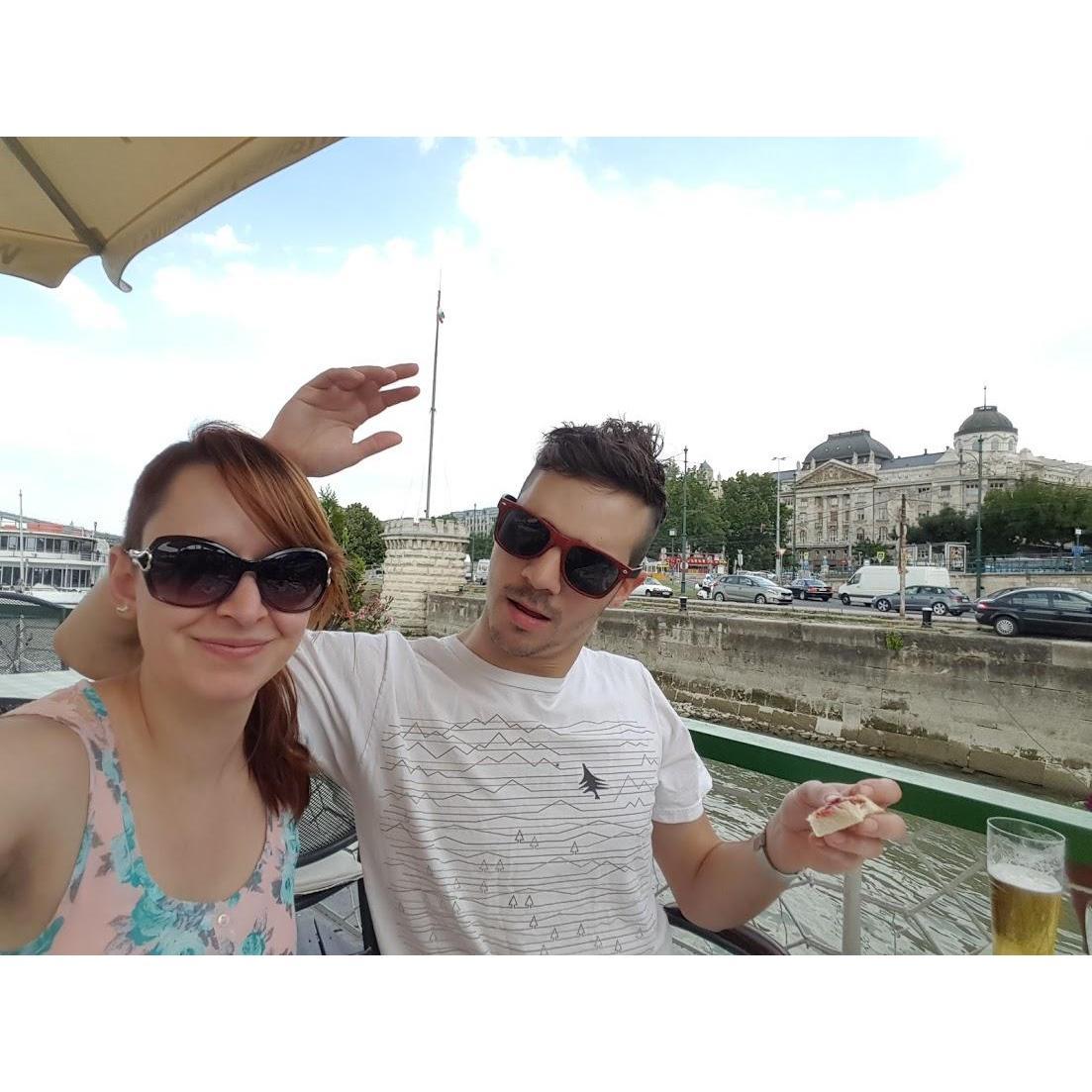 Brady eating goose liver and at the same time showing off his suave moves in Budapest.