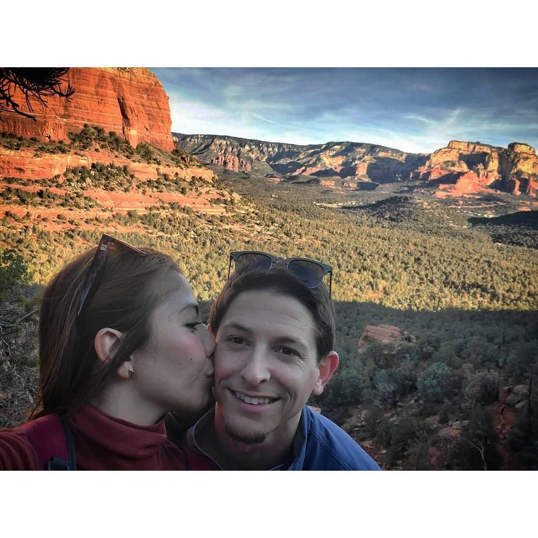We love the outdoors! Hiking up a mountain..
