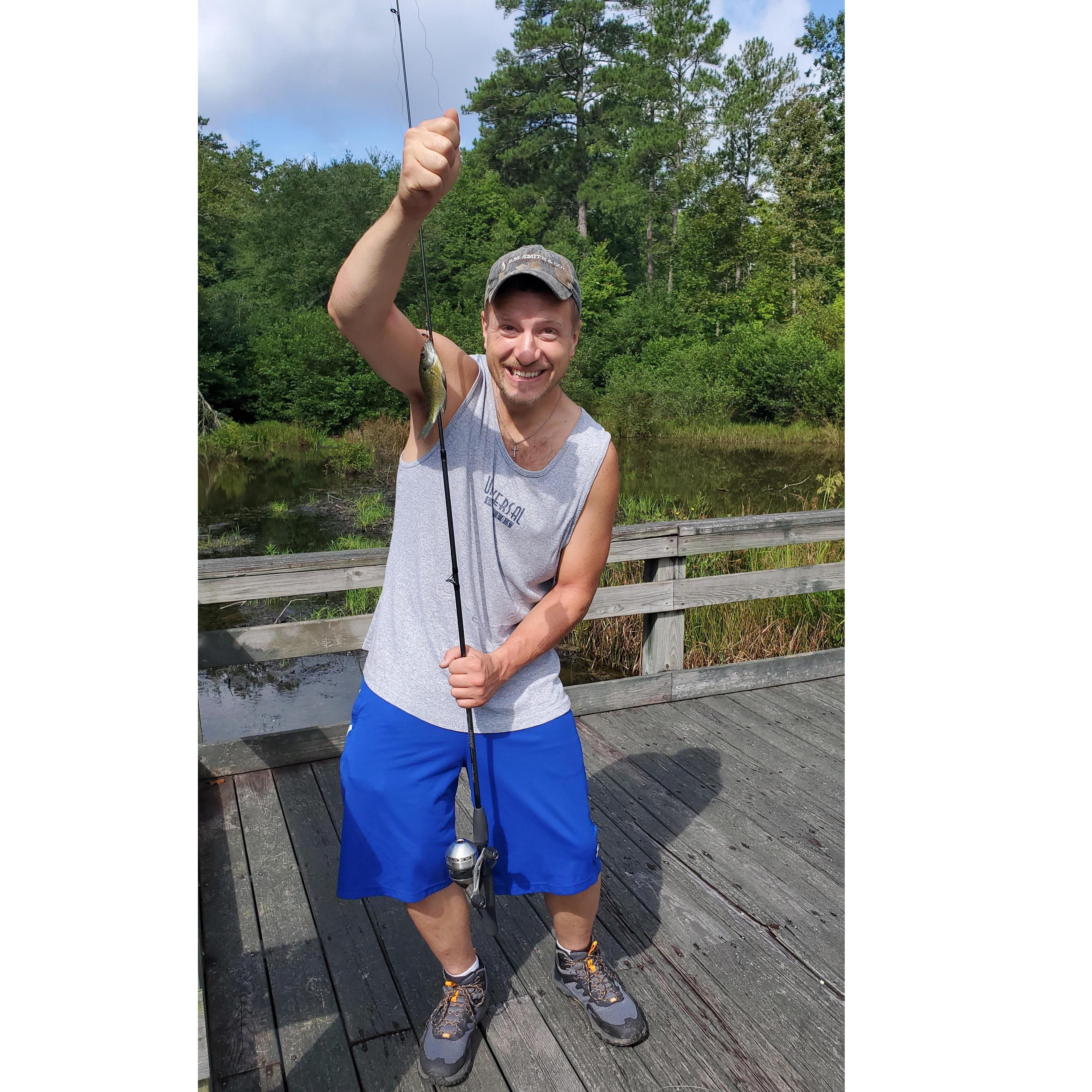 This man sure knows how to fish! Just look at that monster!