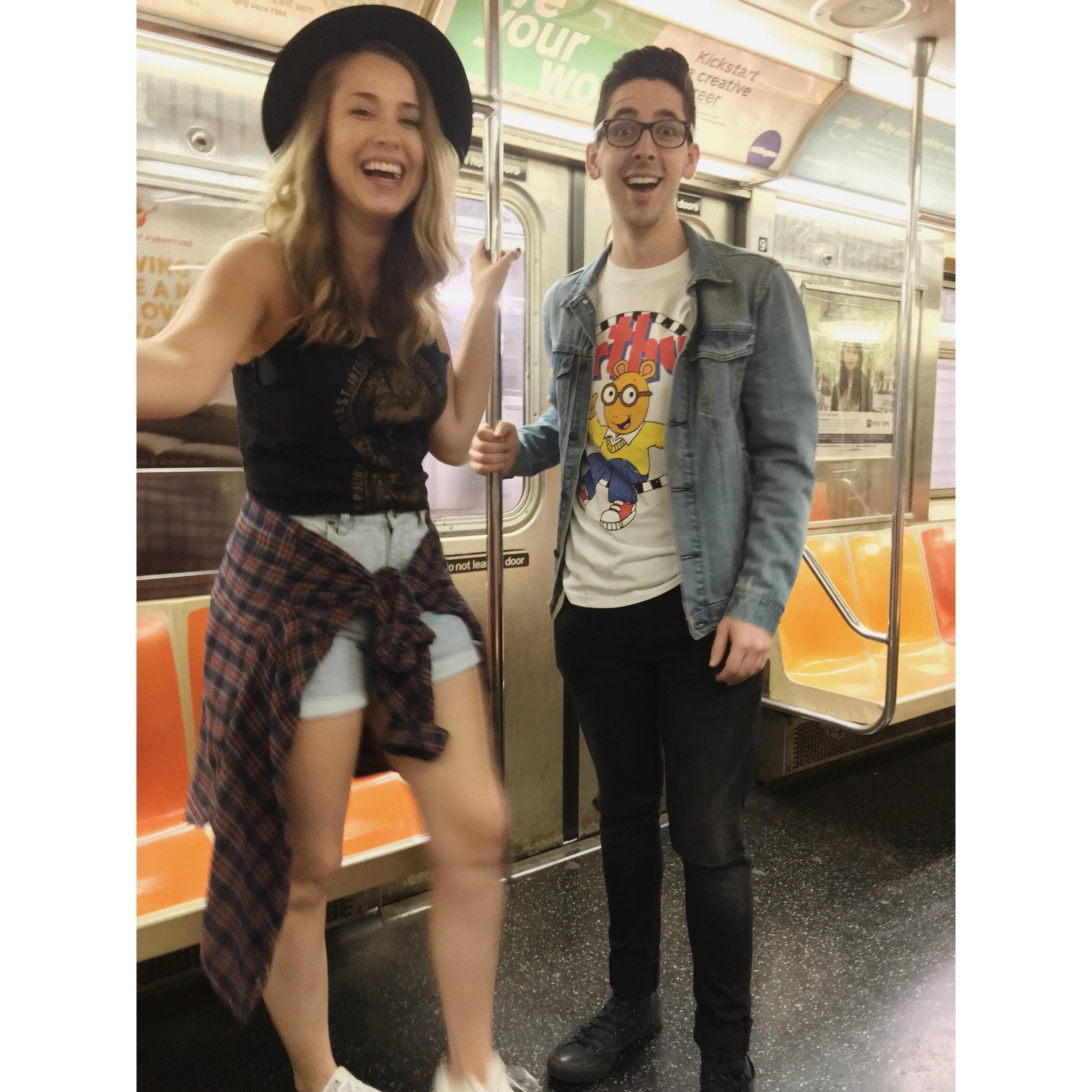 Pardon our awkward expressions – we were really excited in this moment. Who isn't excited while riding the subway?