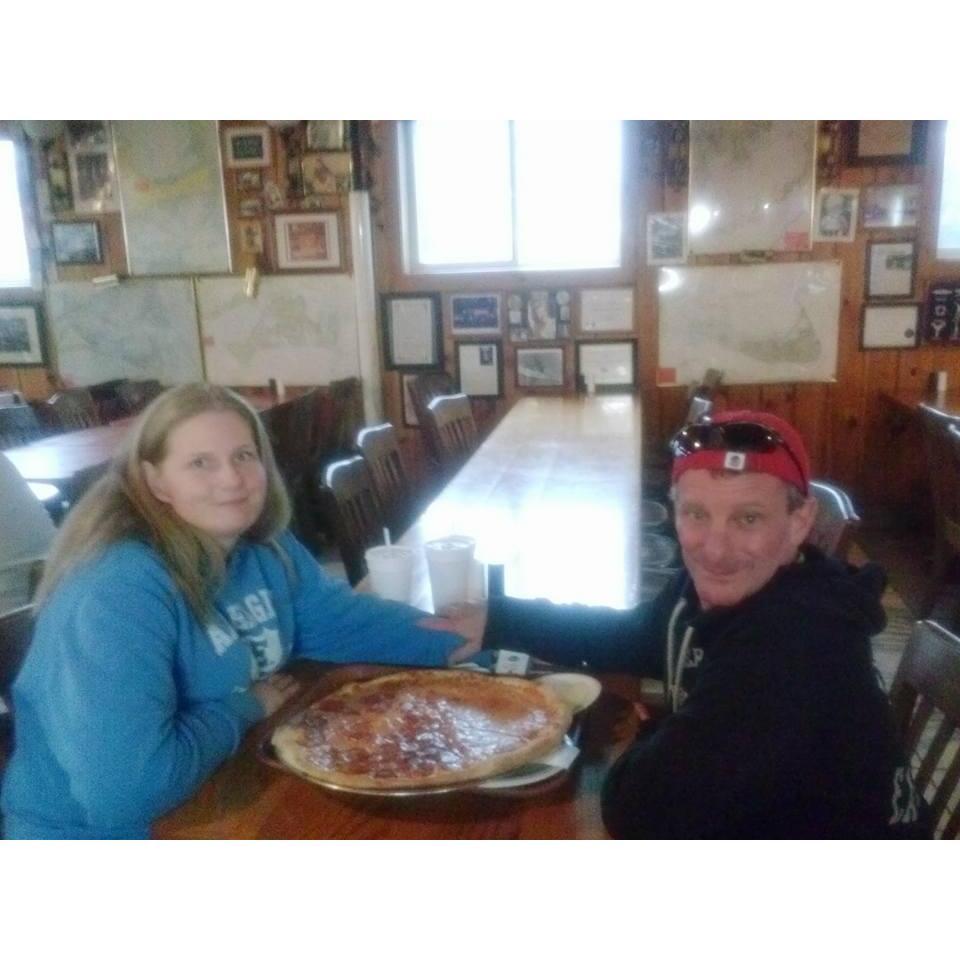 Our very first date at Marc Anthony's!!! (Note the hat backwards, sunglasses, and general wise-ass look). :)