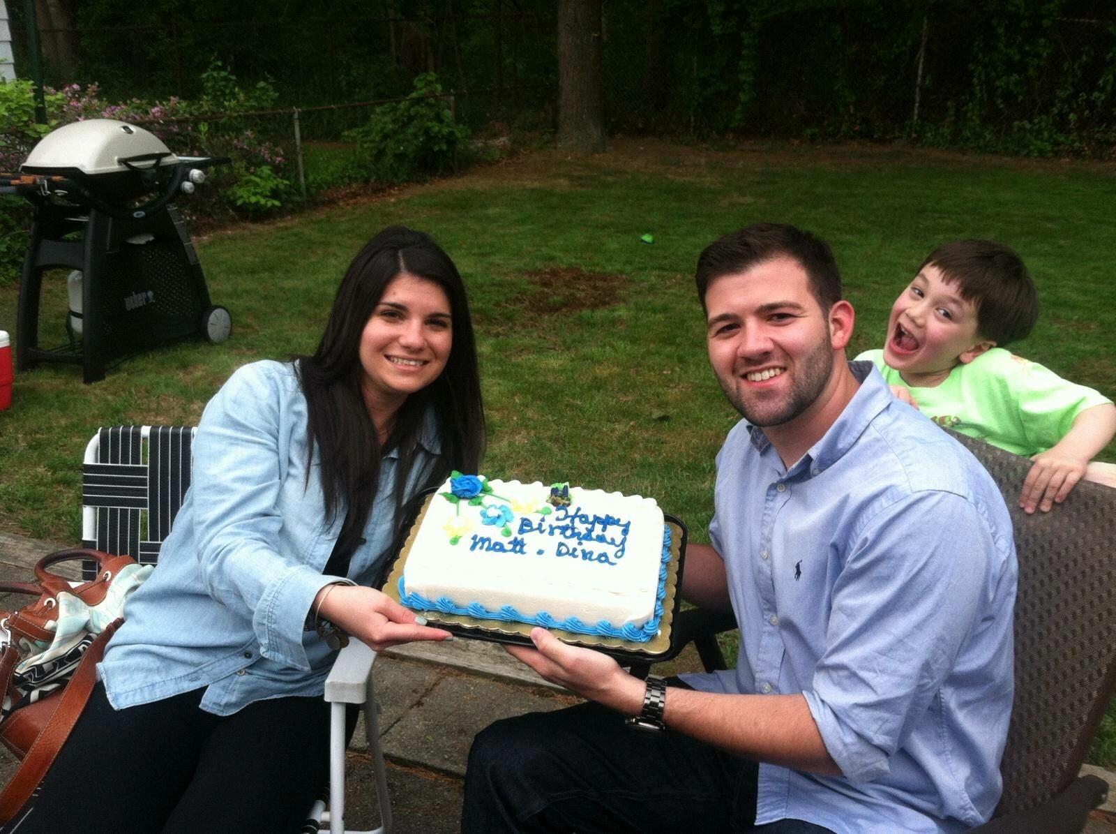 Our 25th birthday cake in 2014 from the Durrigans -- photo bomb by Liam Durrigan himself!