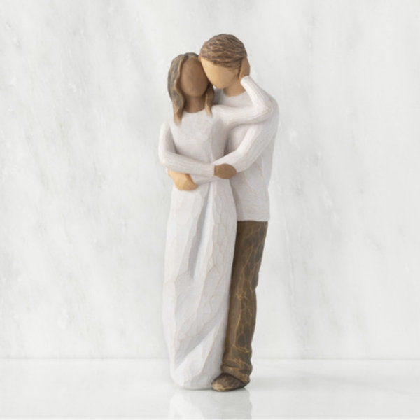 Together (woman: darker skin, man: lighter skin)