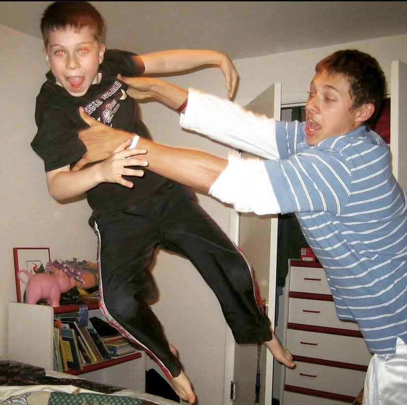 Trevor throwing his little brother and best man Jesse around