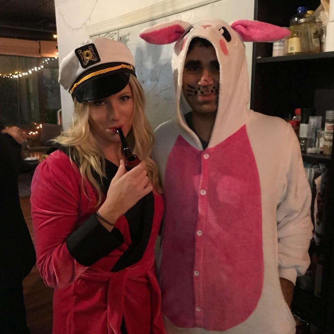 Hugh Hefner and a a very cute Playboy bunny.
