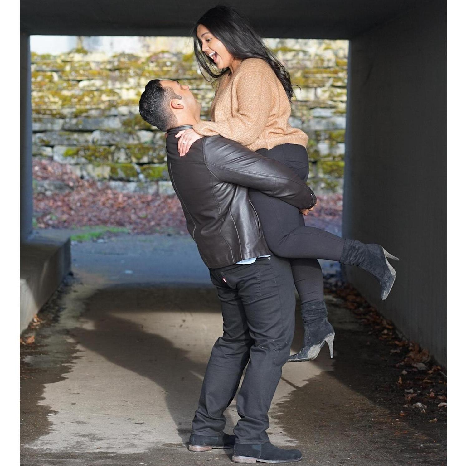 Engagement photos- Sophie wishes she were this tall all the time.