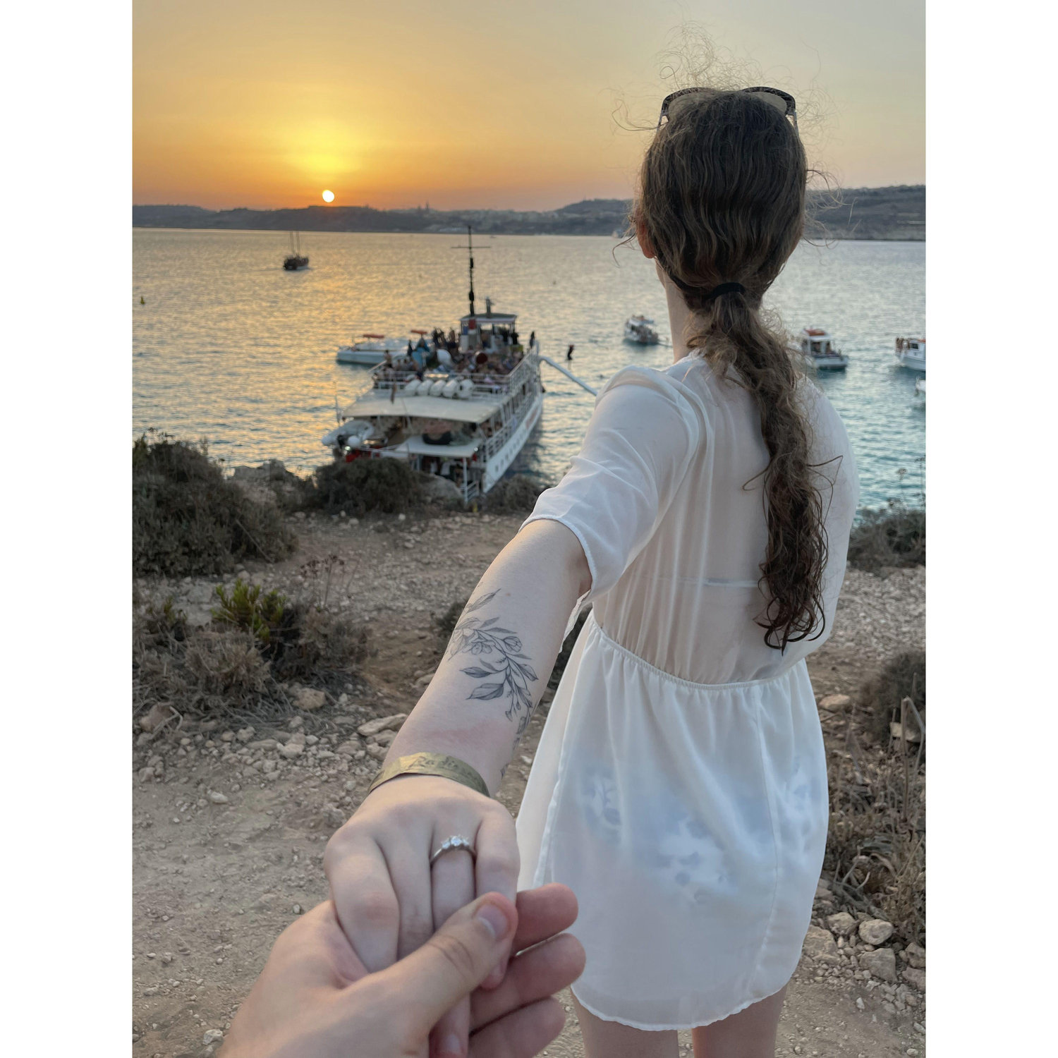 Took a boat tour to another island in Malta where Anneka swam and we watched the sunset together - Malta - August 2024