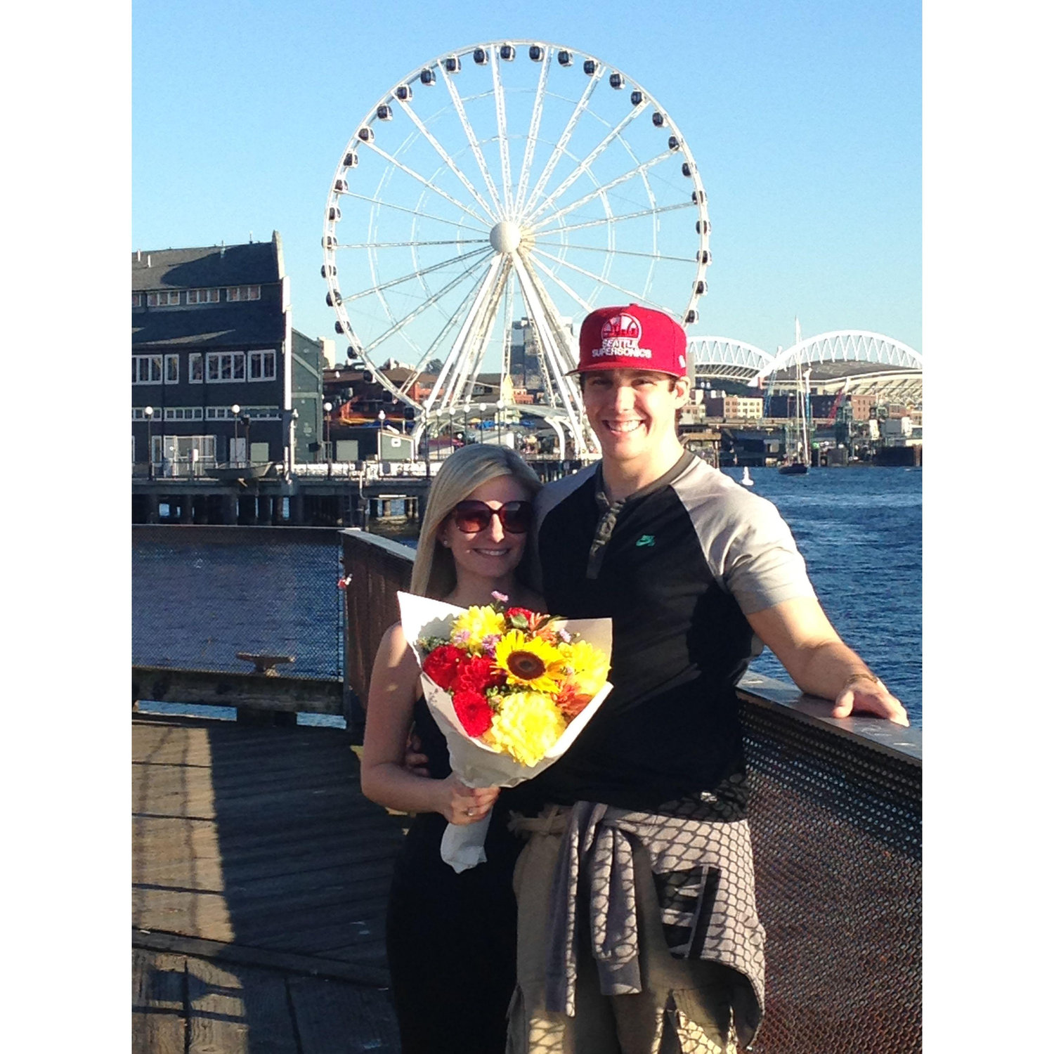 One of their first trips to Seattle together in Sept 2014. Zac loves to get Jessica flowers at Pike's Place Market.