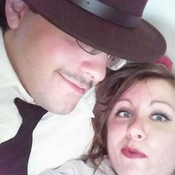 Halloween party in 2014. Dave is dressed as Andrew Ryan from the video game Bioshock, and Abby is dressed as Rosie the Riveter