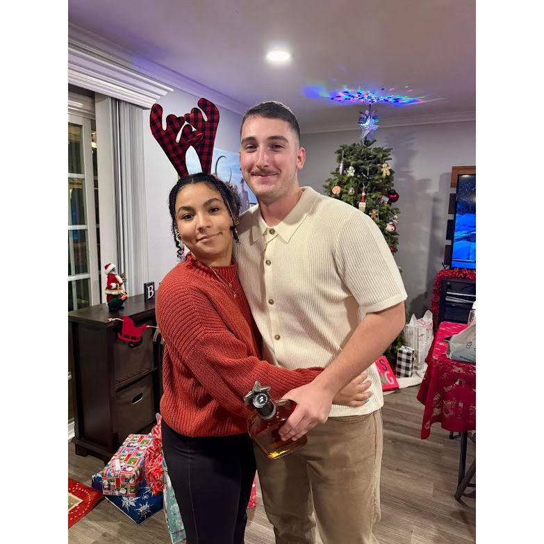 Our first Christmas, Joey gave my dad whiskey.