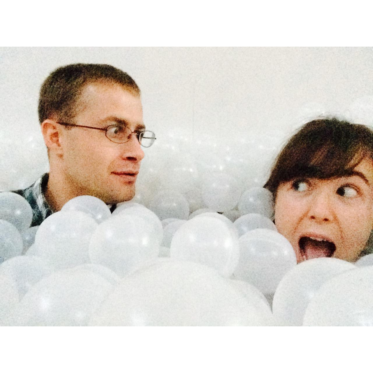 The first date Katie ever planned was inviting Daniel to the National Building Museum to experience the art exhibition, "The Beach," where the entire first floor was turned into a ball pit.