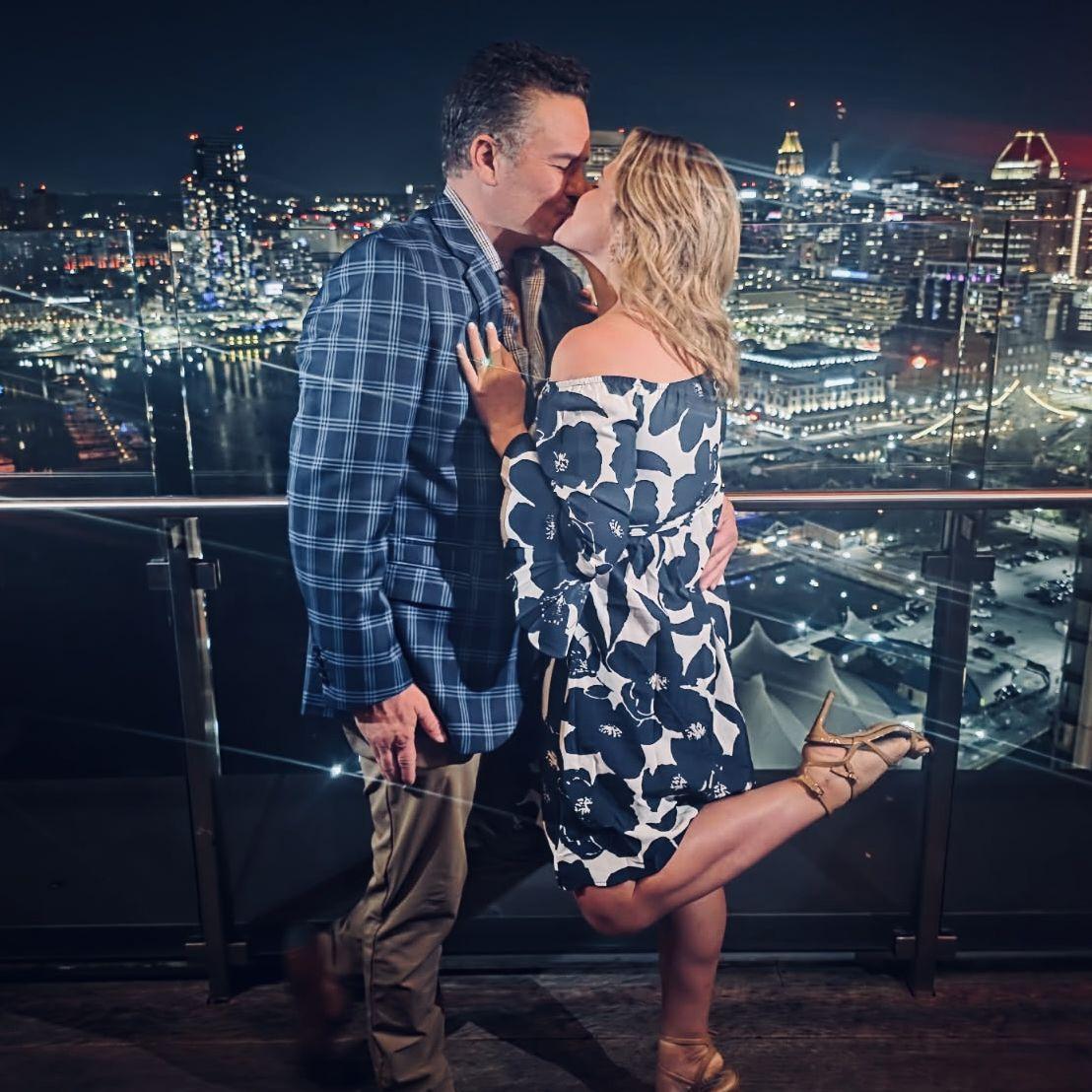 On the rooftop of the Bygone celebrating our engagement!