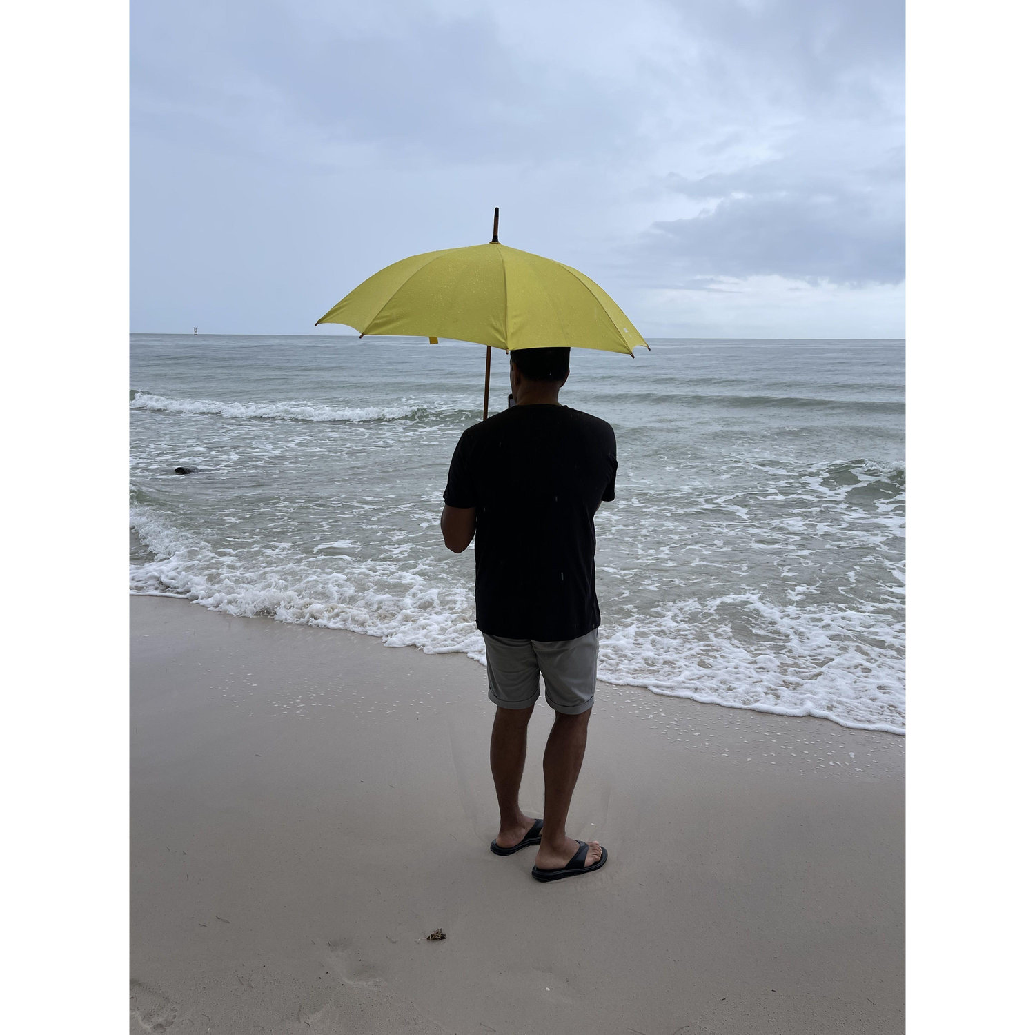 AJ at Hua Hin beach on a rainy day