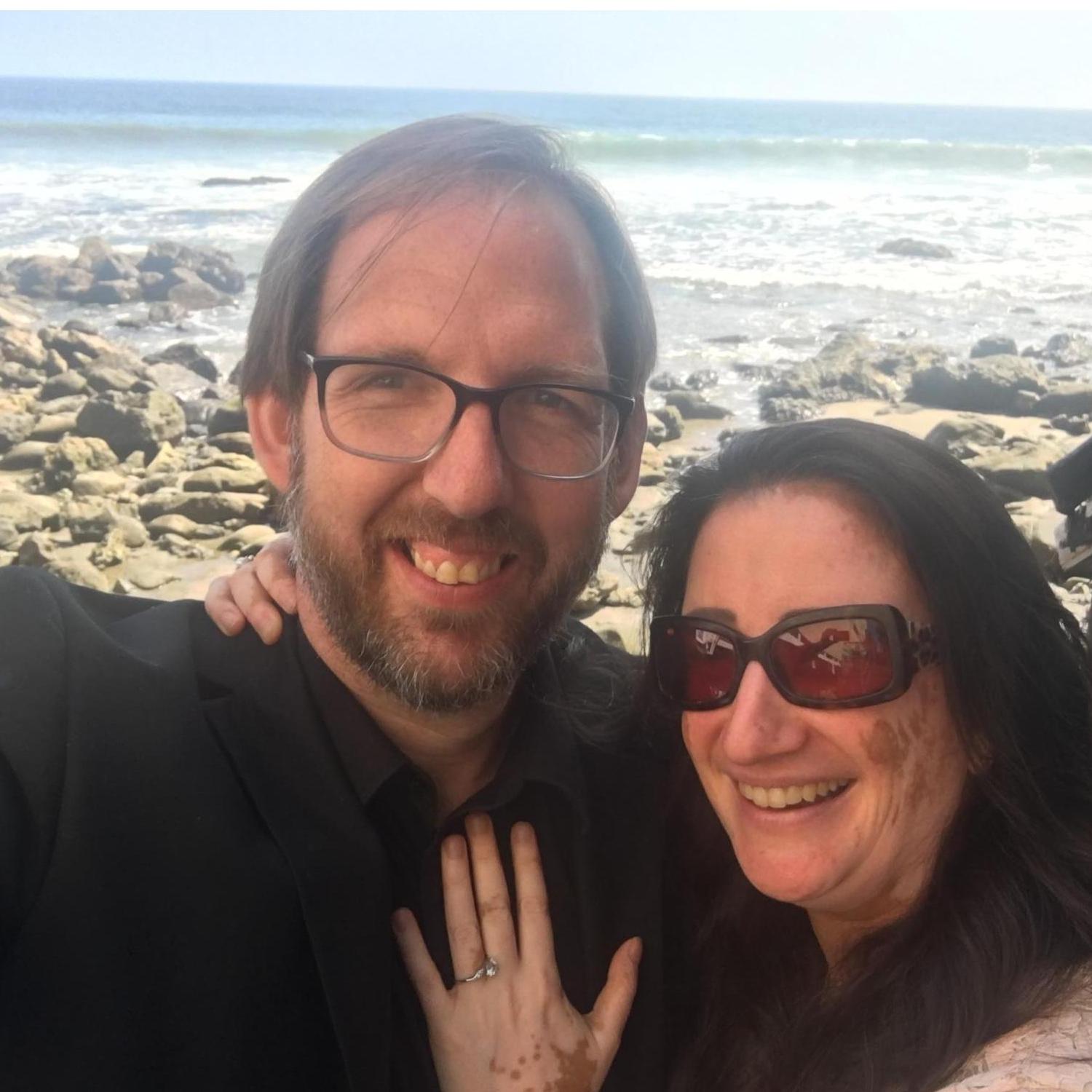 The proposal, on the beach that was no longer, where we spent our 1st anniversary eating oysters on a picnic blanket.