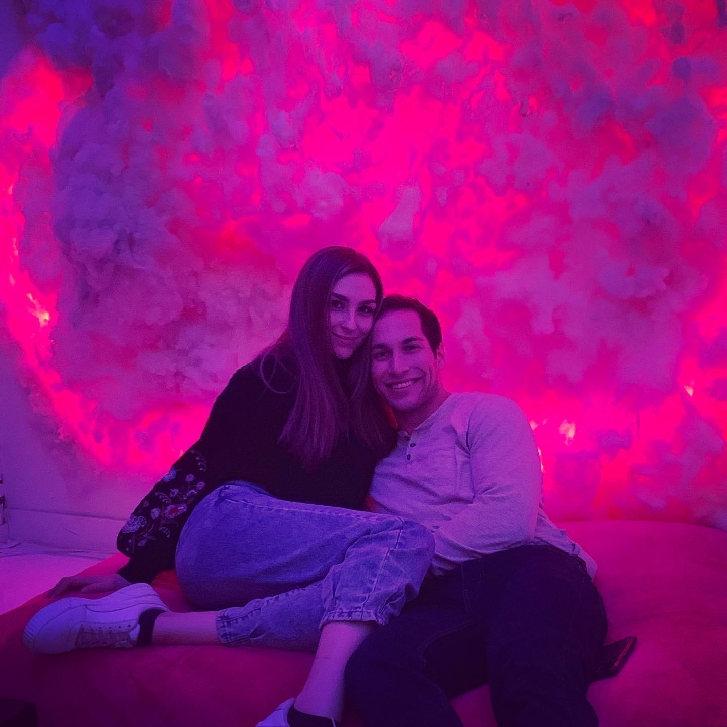 Another great photo at Rainbow Vomit. We were sitting on a cushion in the clouds when a stranger came up to us and insisted she take a photo. So cute :)