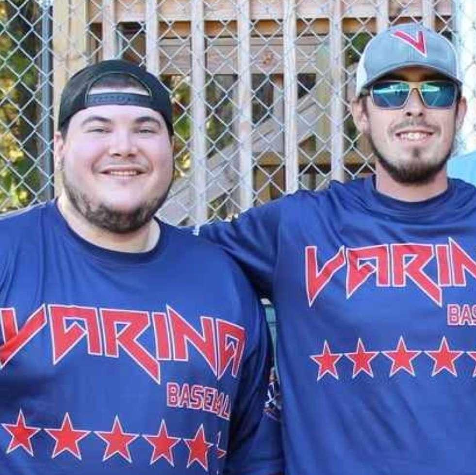 Zachery and Tim (groomsmen) coaching baseball together