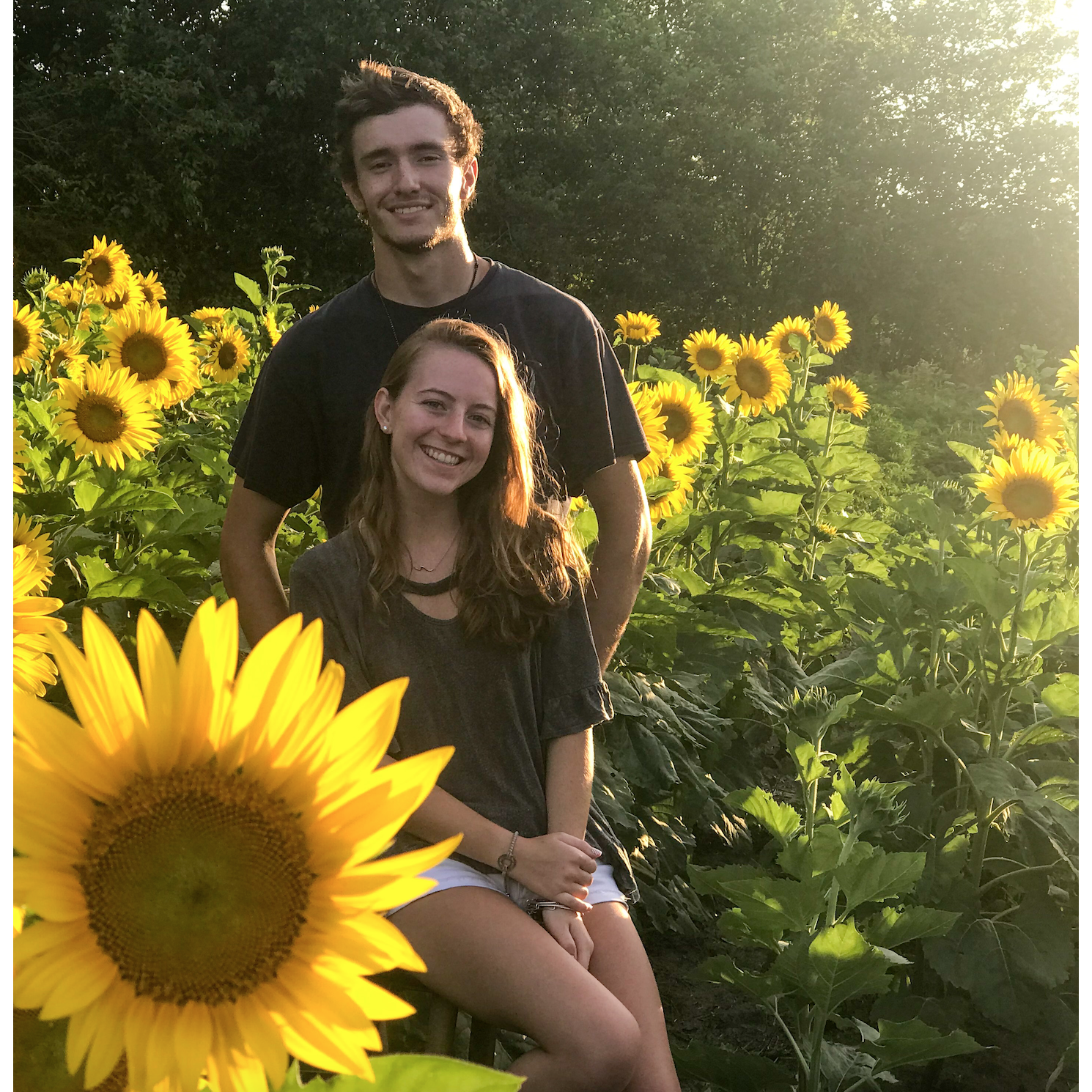 We snapped a quick pic in the sunflower field behind Nick's house before leaving for a four wheeling trip!