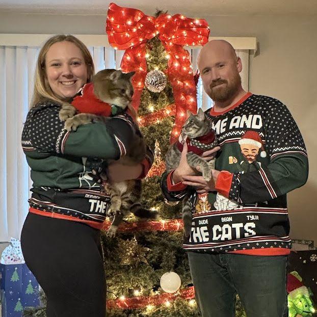 First Christmas as a little family with the cats.