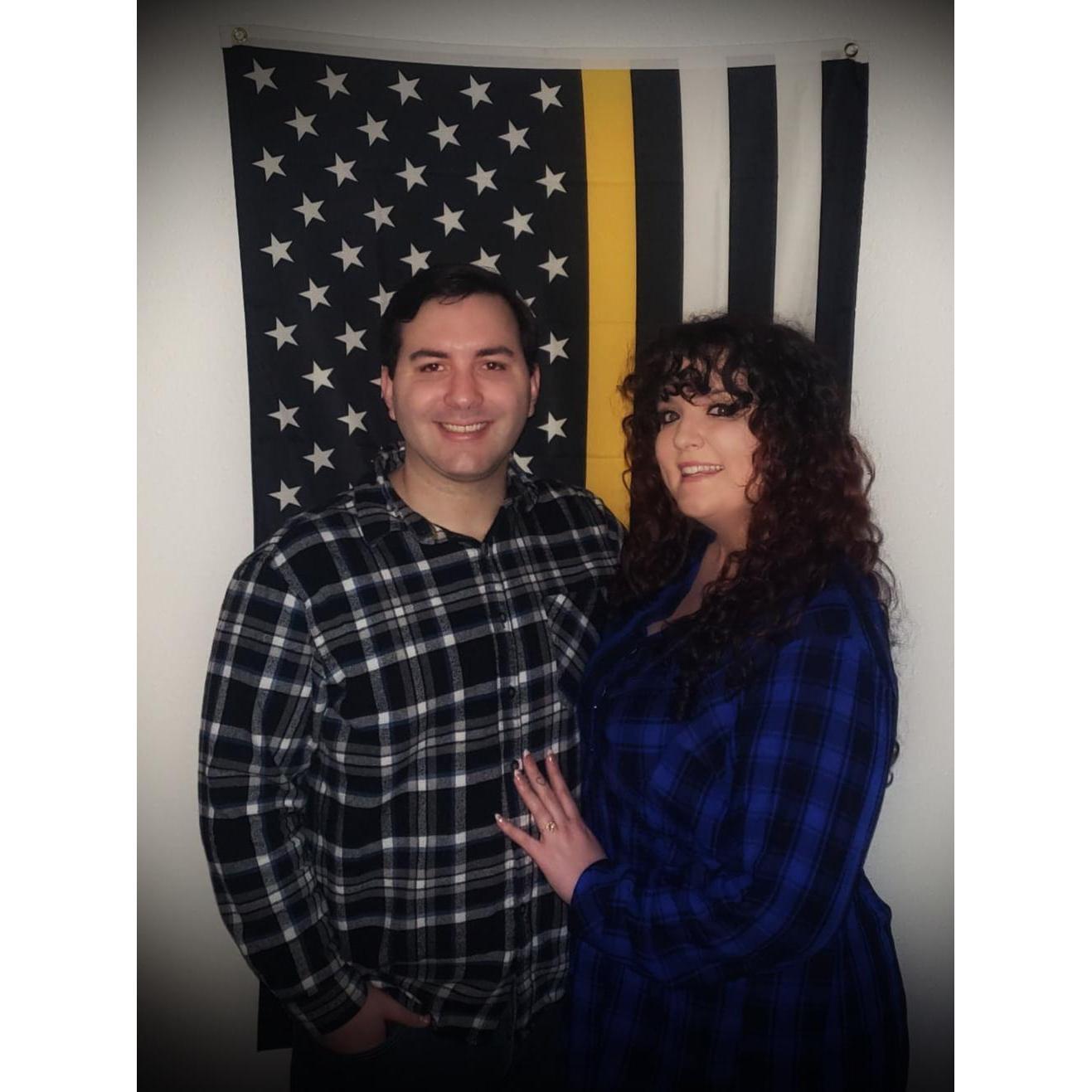 We took engagement pics in front of a Thin Gold Line flag to show our support for 911 Dispatchers