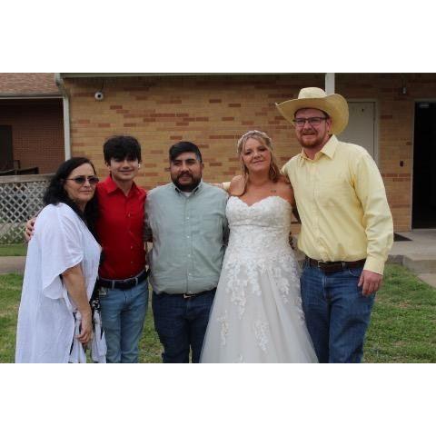 Josh with his family at his sister Bailey's wedding. From the right: Latosha (mother of the groom), Robert (little brother), Roberto ( step dad), Bailey ( sister)
