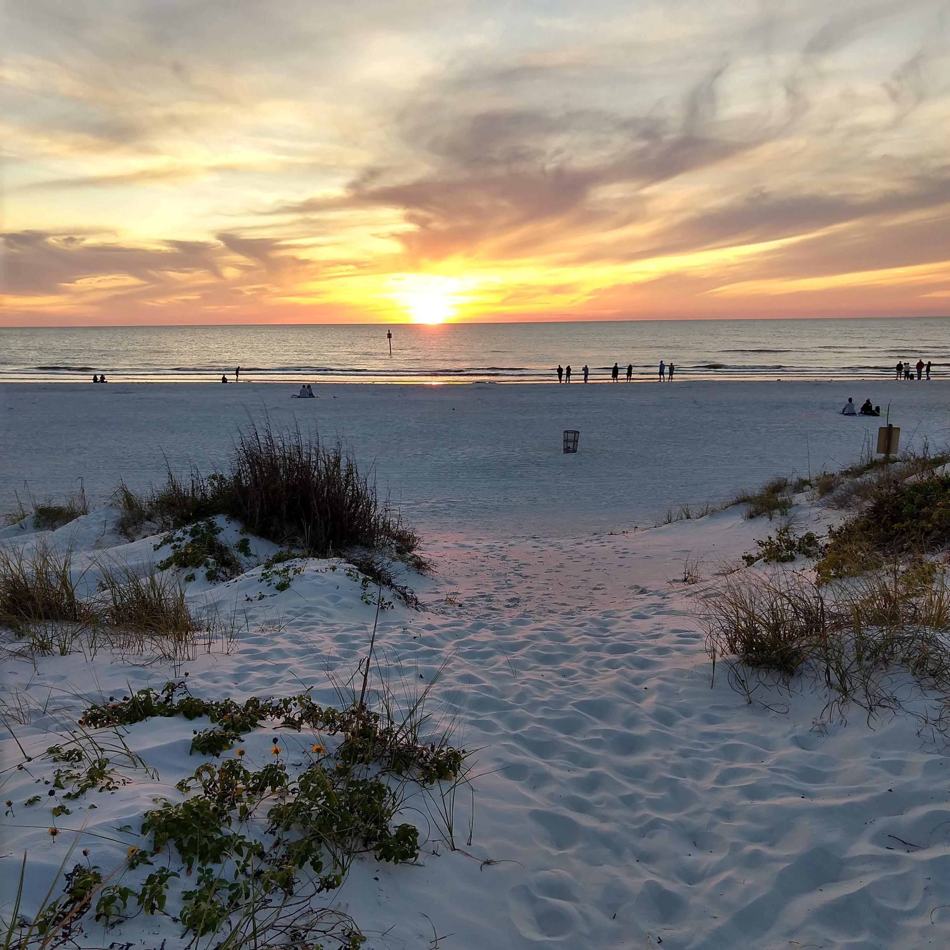 Clearwater beach Florida!  The engagement ring was in my pocket at this point