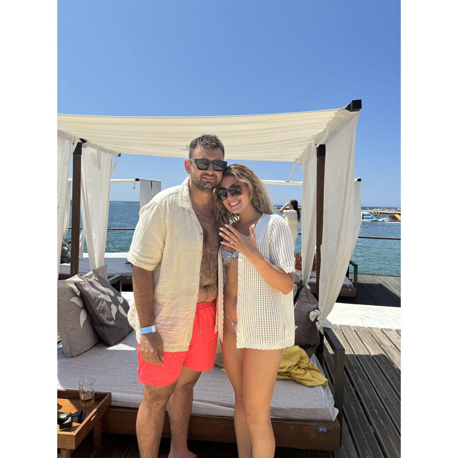 The day after we got engaged! We spent the day at a beach club in Lagos Portugal.