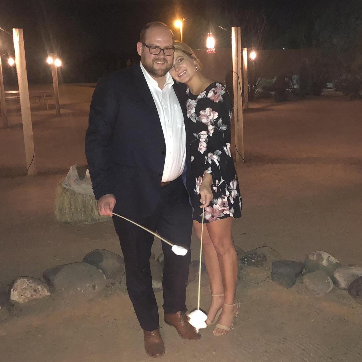 Roasting marshmallows at the first wedding we ever went to together. Dec 2018