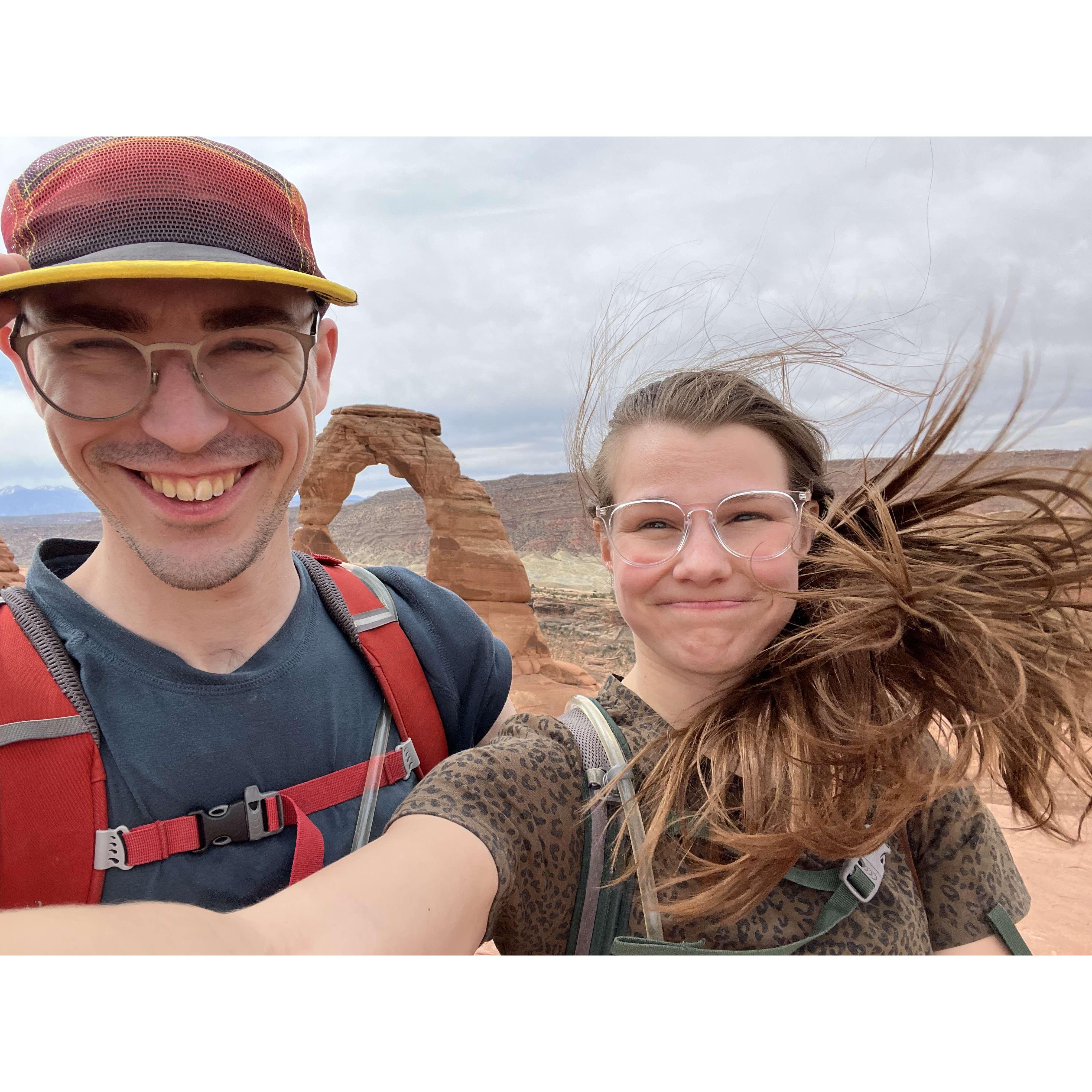 Getting blown away at Delicate Arch