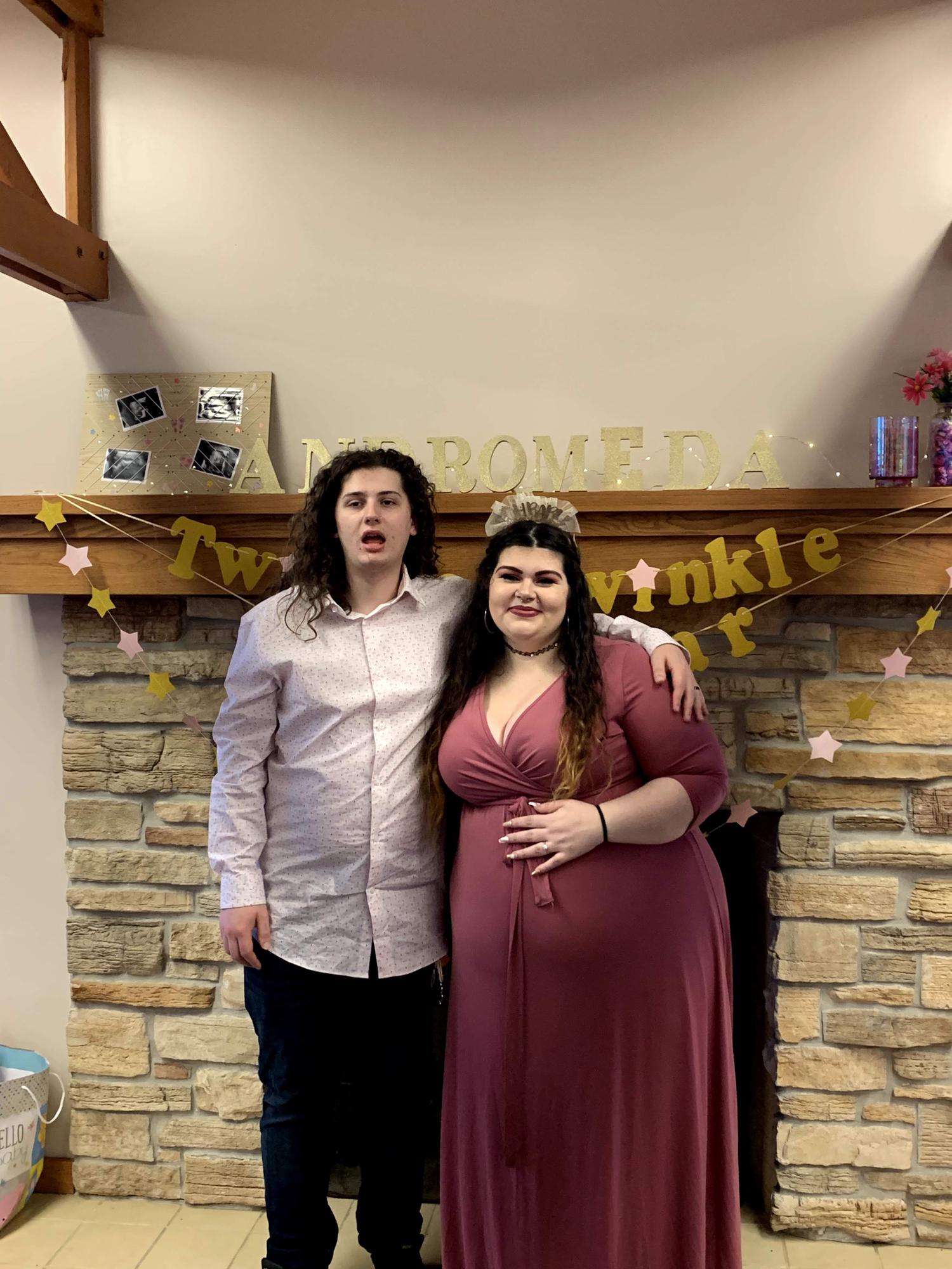 Austin's face when he's told to smile (at our baby shower!)