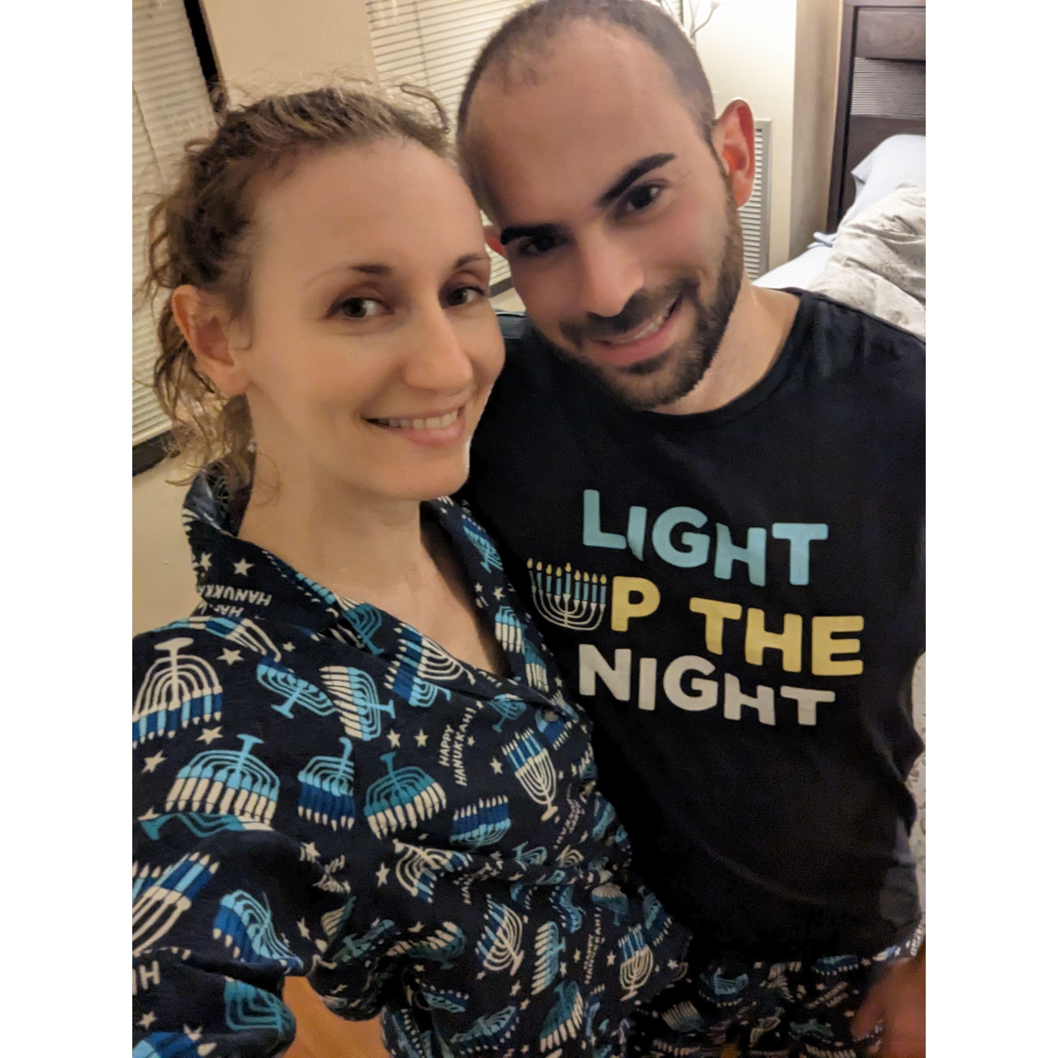 Jesse humoring Sveta in Hanukkah pajamas (that glow in the dark!) Dec 2022