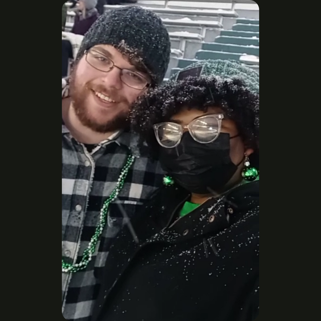 Mark became an honorary Spartan when visiting Kennedy in East Lansing! Here we are at a chilly snowy football game!