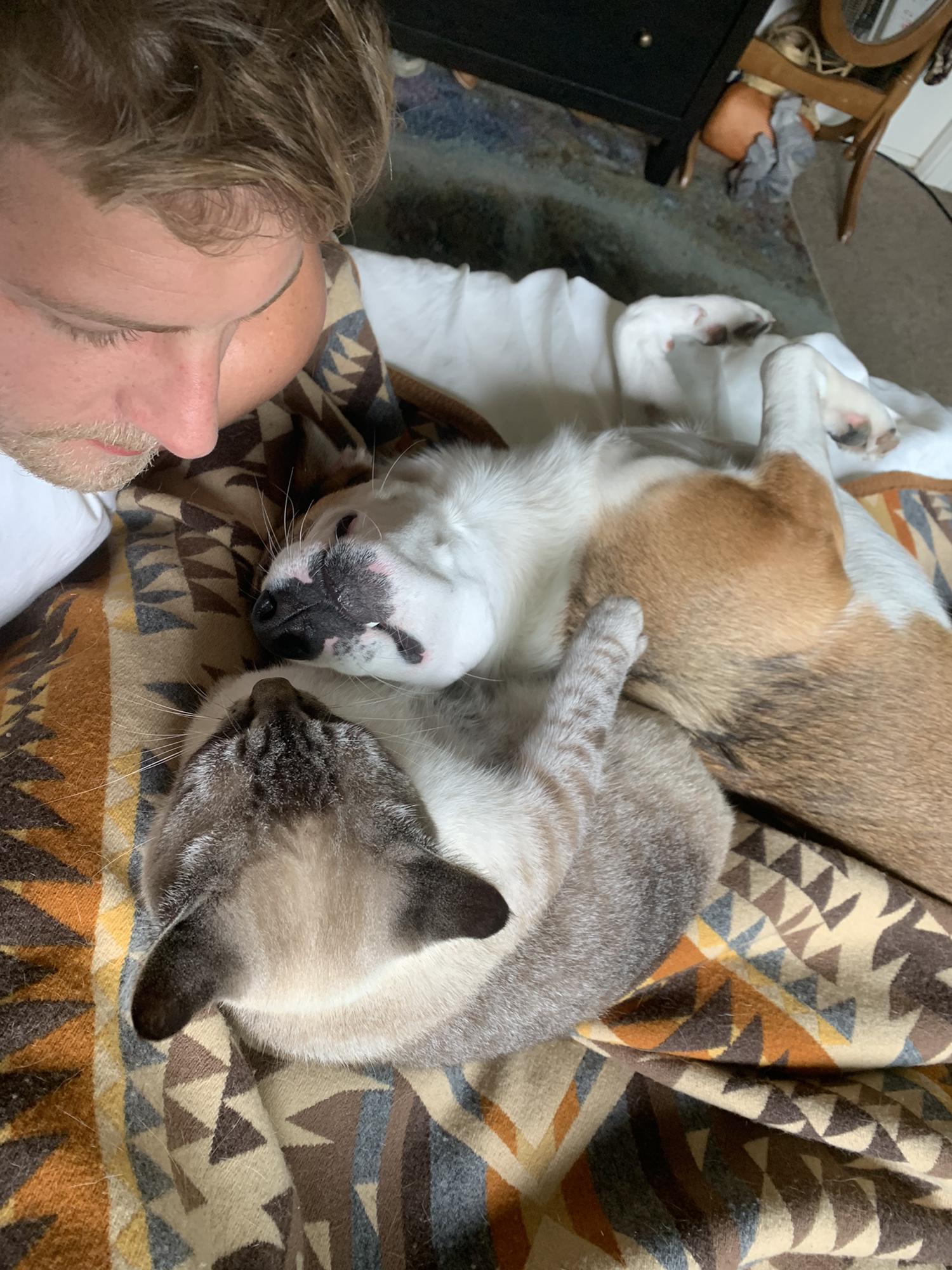 Kyle Buck and Critter having a cuddle sesh
