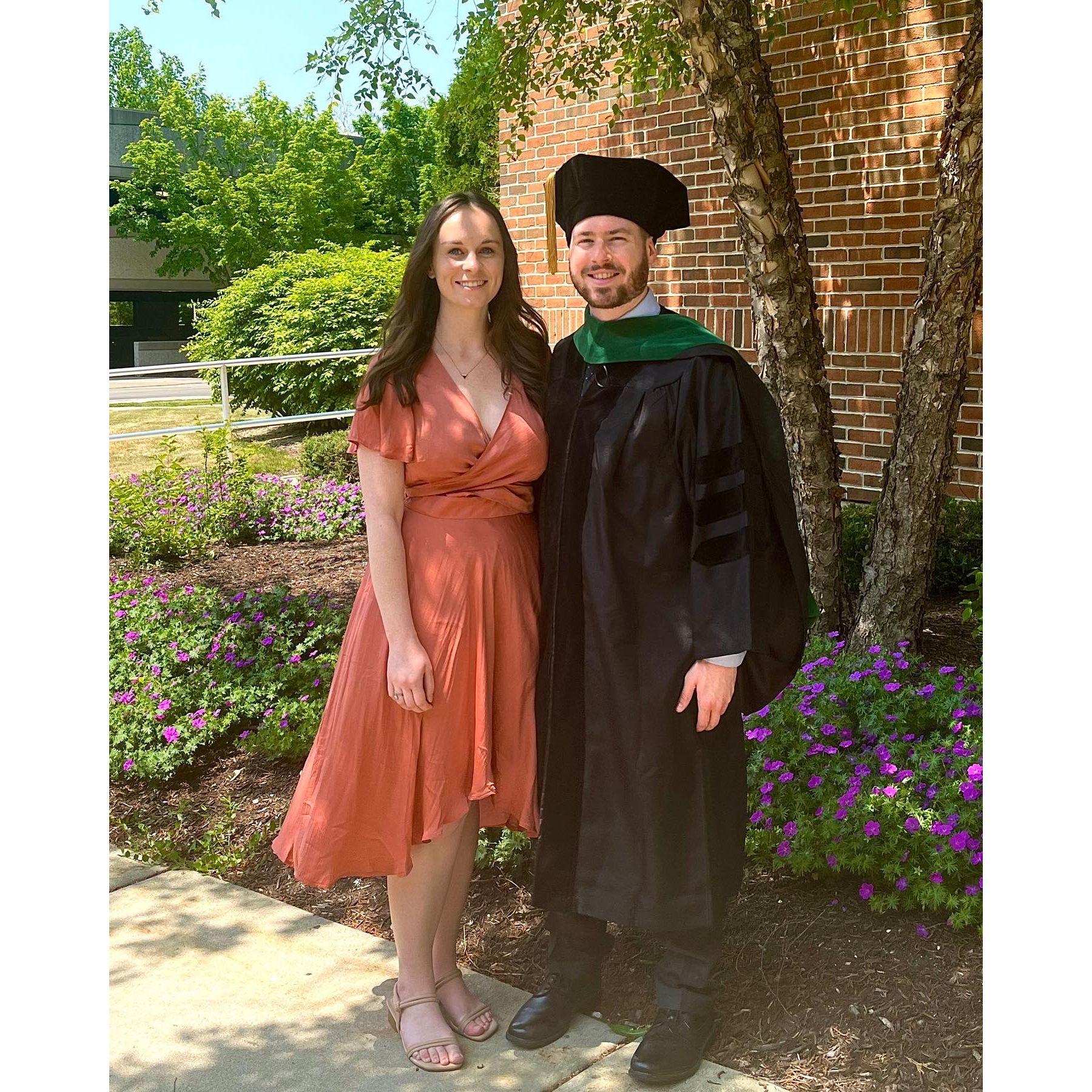 May 2023: Josh and Courtney on the day that Josh graduated from medical school.