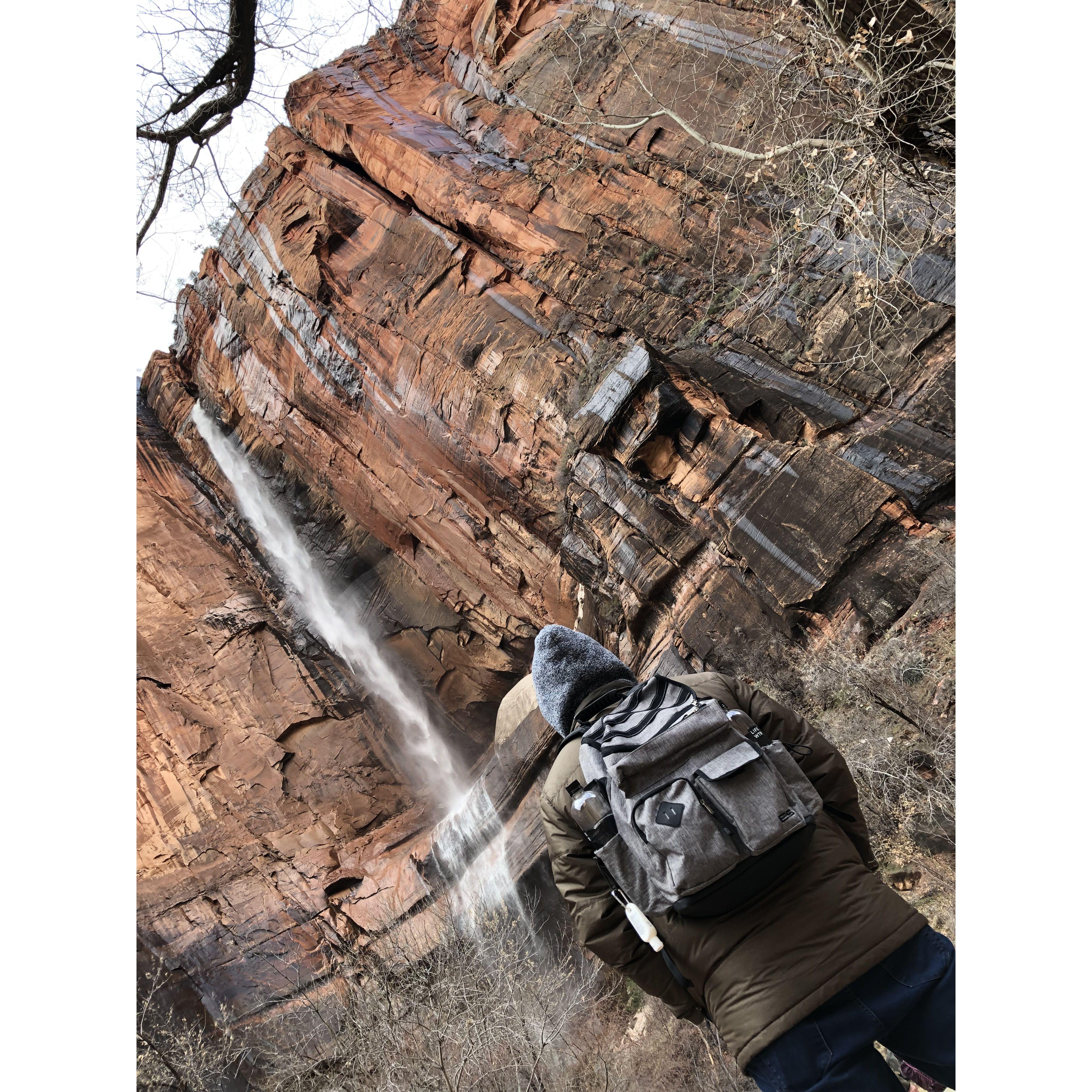 Matt admiring a waterfall on one of our hikes @ Zion