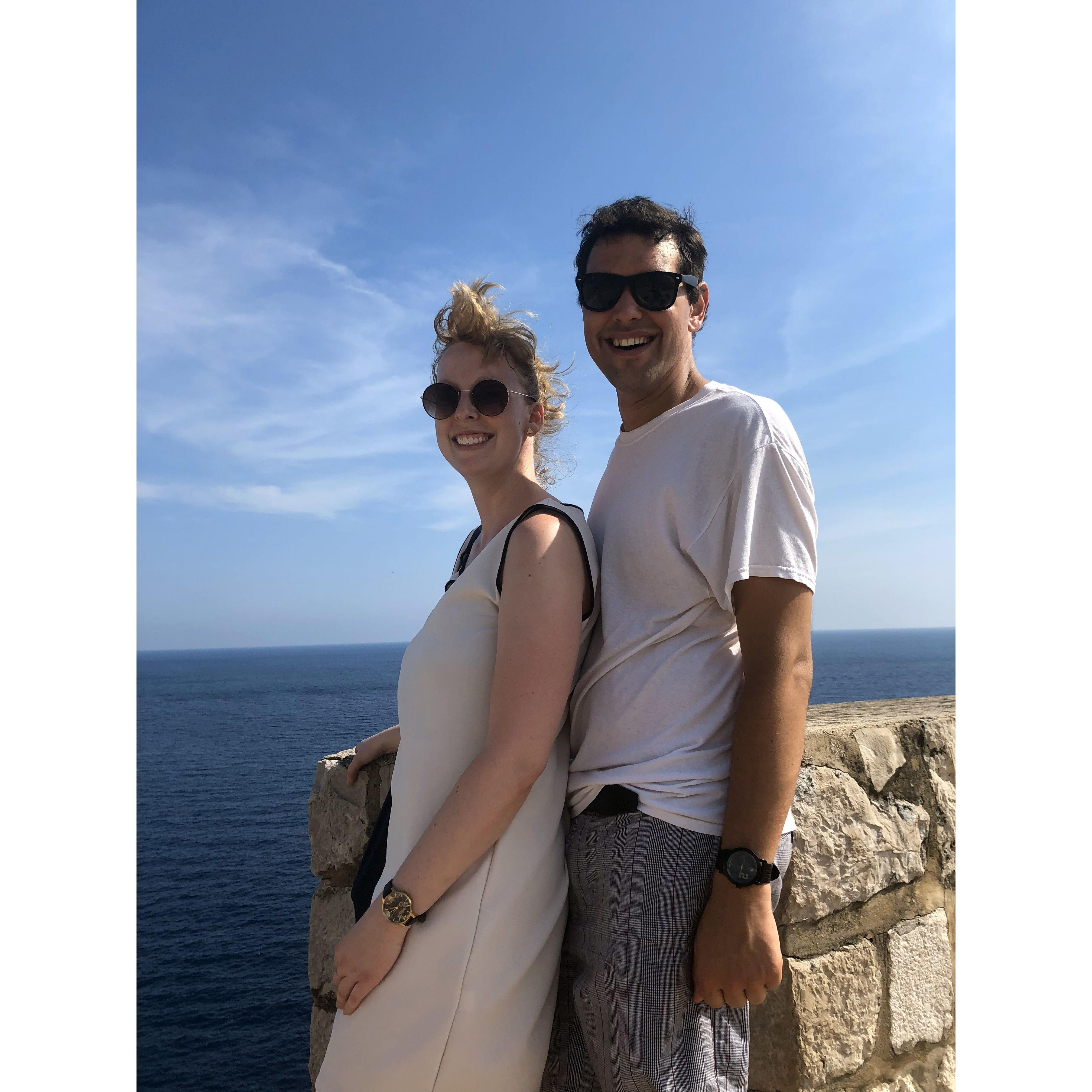 About 3 months after meeting, we went abroad together. Why not? In Dubrovnik, a stranger said we were cute and asked to take this photo. (Emily's luggage was lost and this was not her dress)