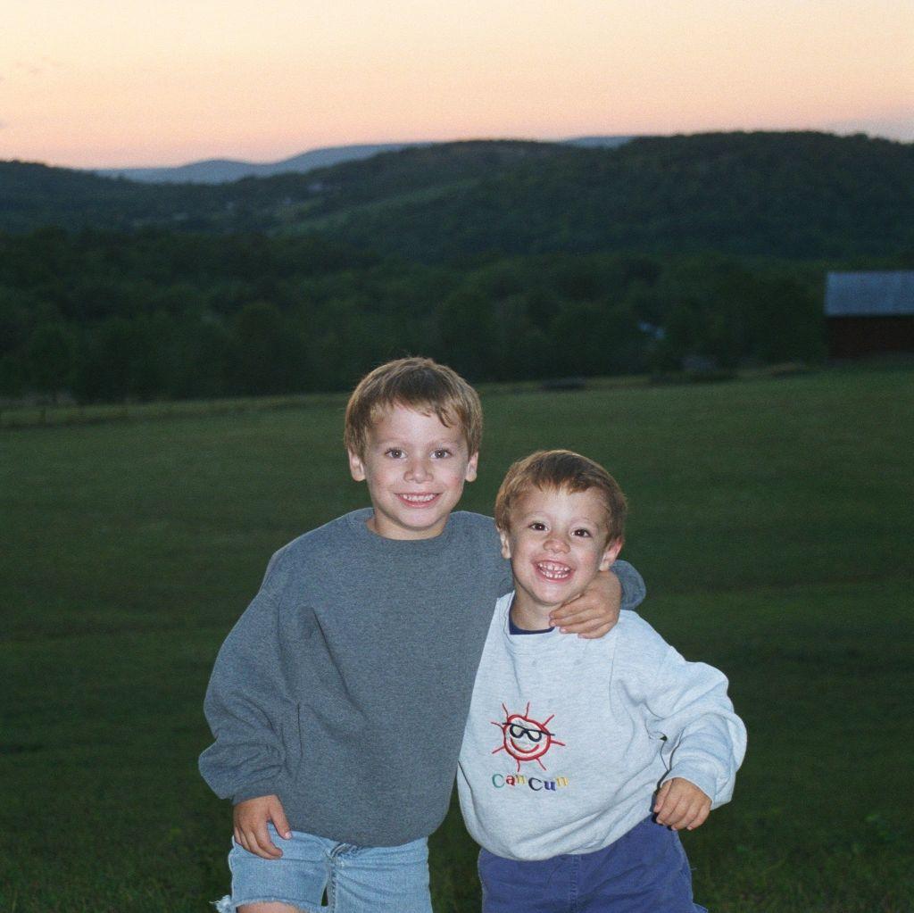 Luke and his brother Jake on the farm as kids.