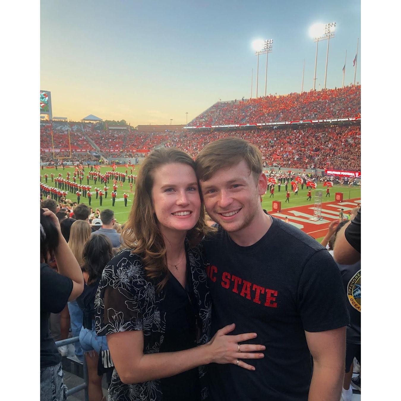Our first photo together! NC State game day, September 2022