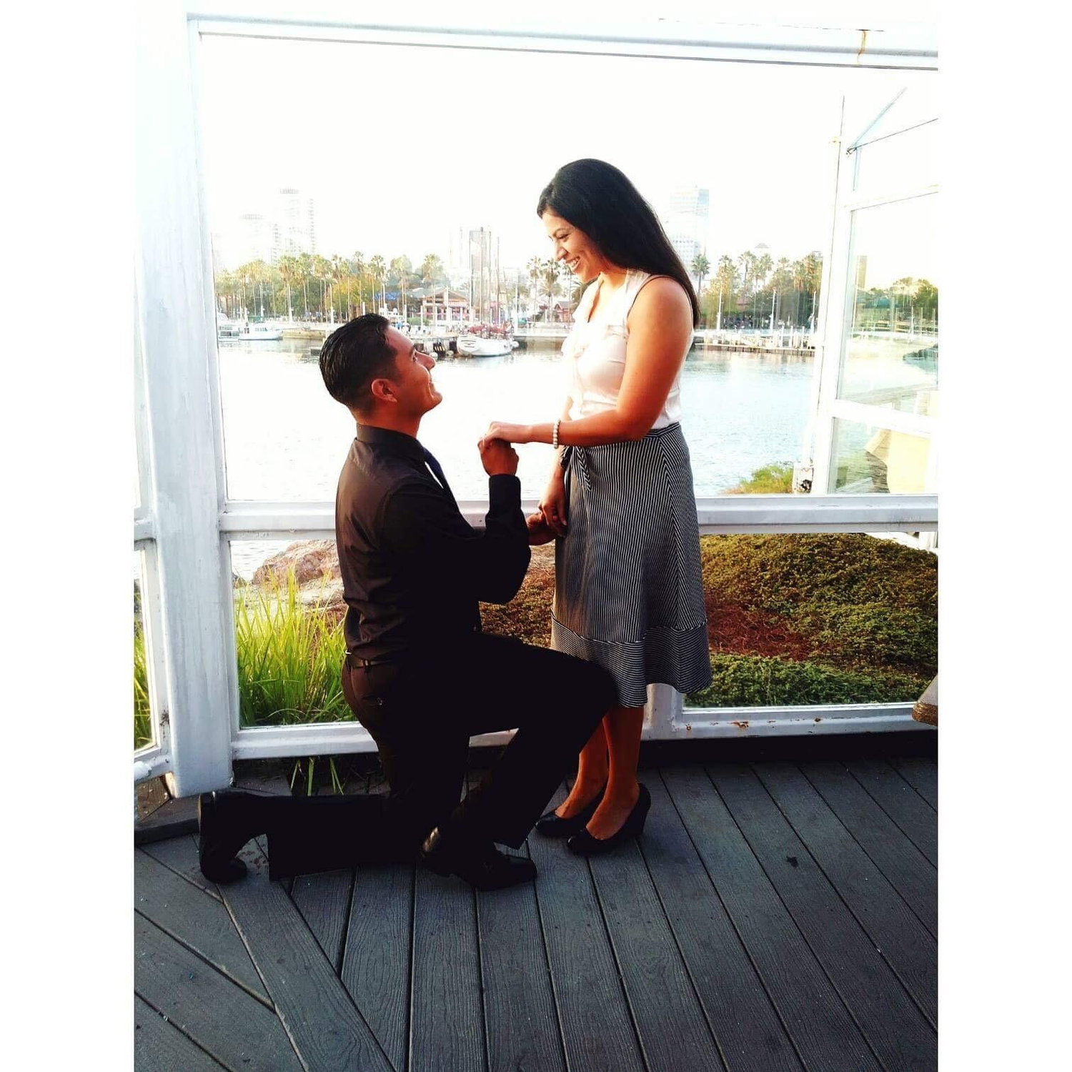 Engagement picture from Parker's Lighthouse. A perfect view of the water.