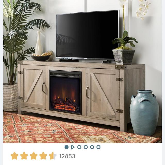 Tv stand with fire place.