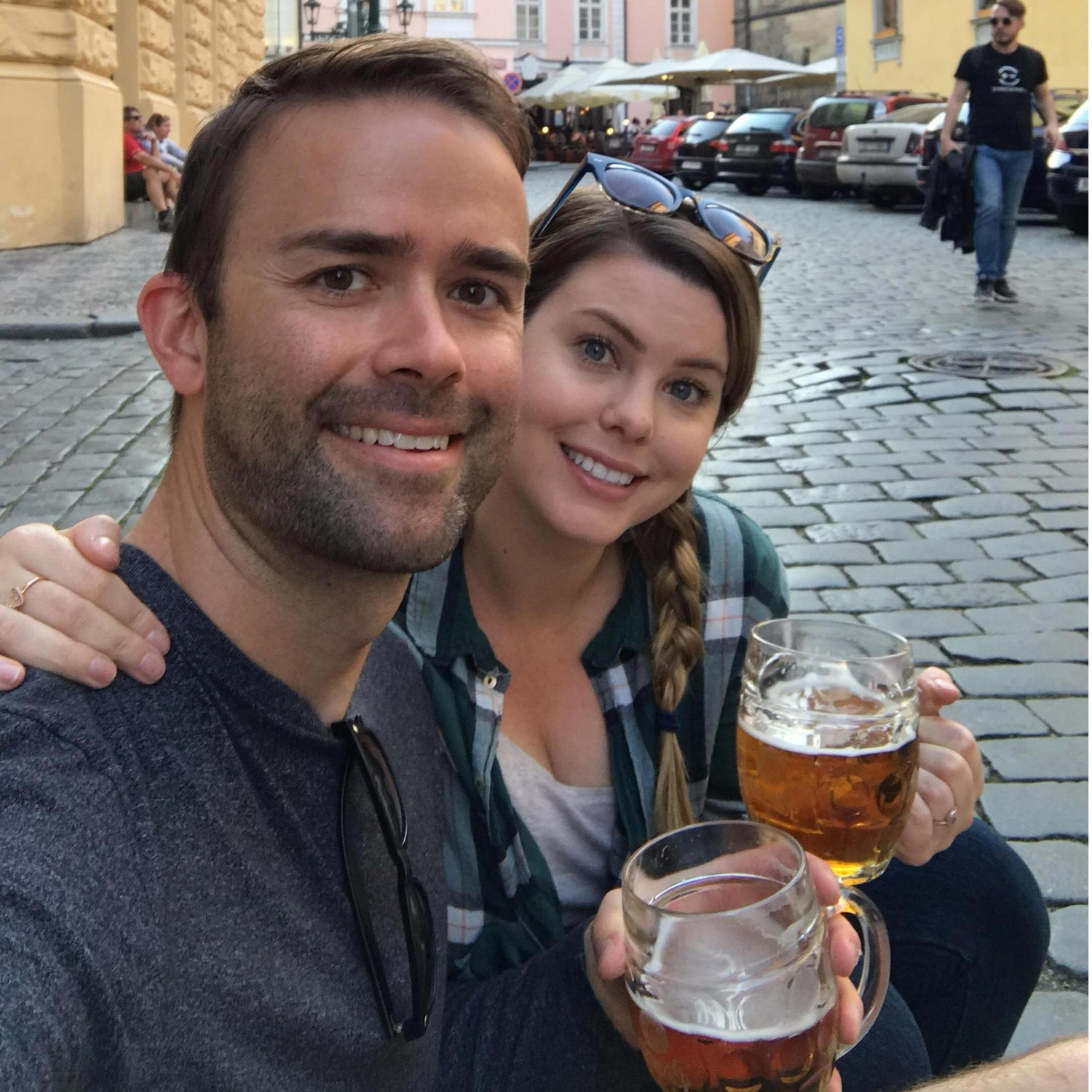 Sharing a beer on the streets of Prague