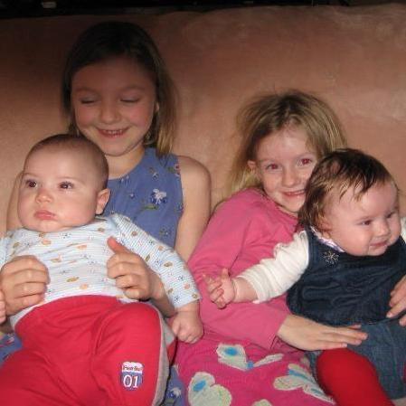 Little Zoie (holding Brandon) and Eleni (holding Marina)
