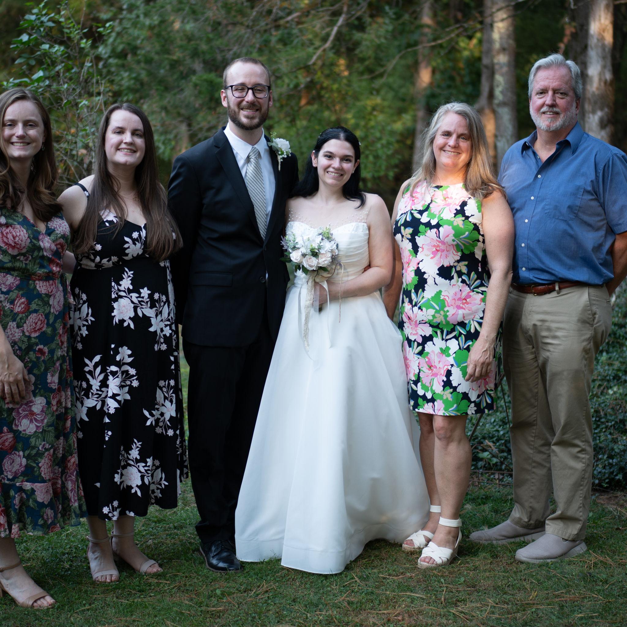 The couple with Scott's family, the Trumpores