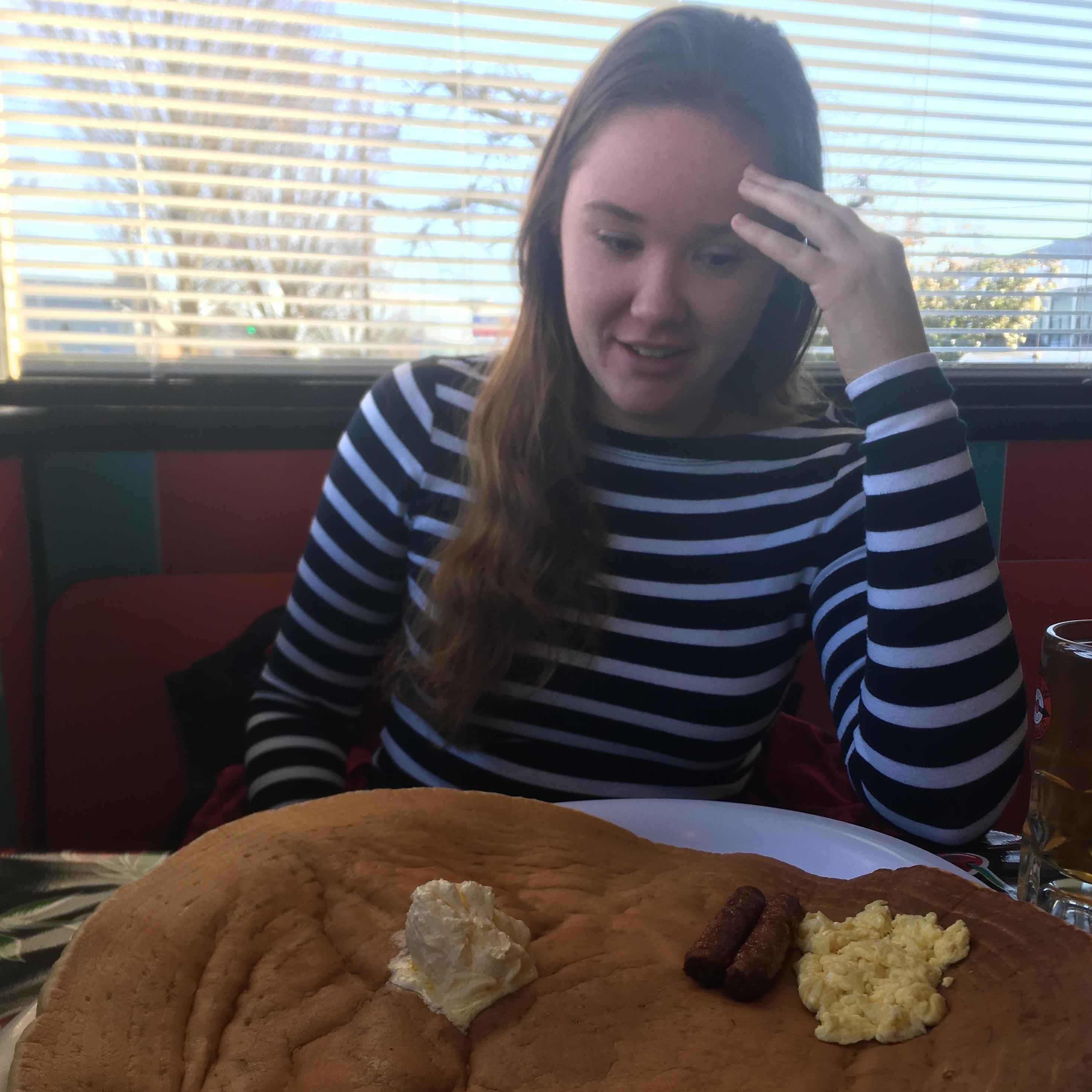 Devin introduces Kylen to an obscenely large pancake