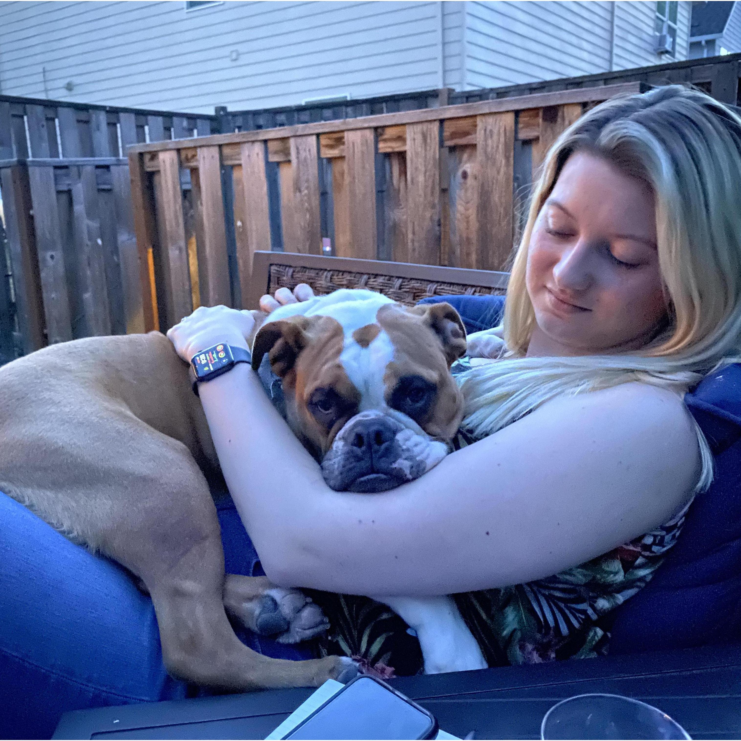 Sydney snuggling the cutest nugget in the world, Reno. (Summer 2020)