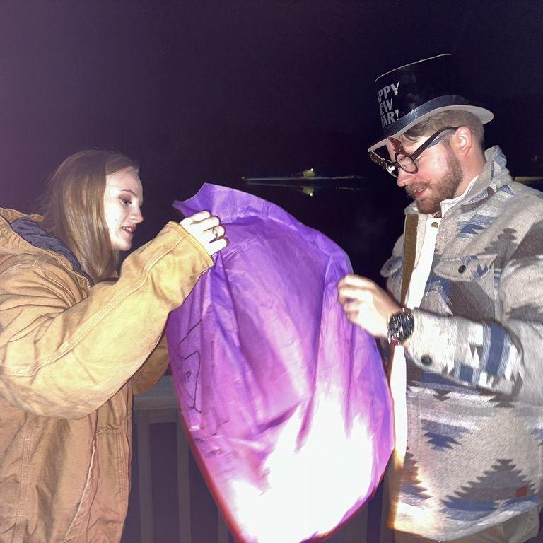 [December 31, 2023] Practicing Abby's family tradition of lighting floating Chinese lanterns on New Year's Eve