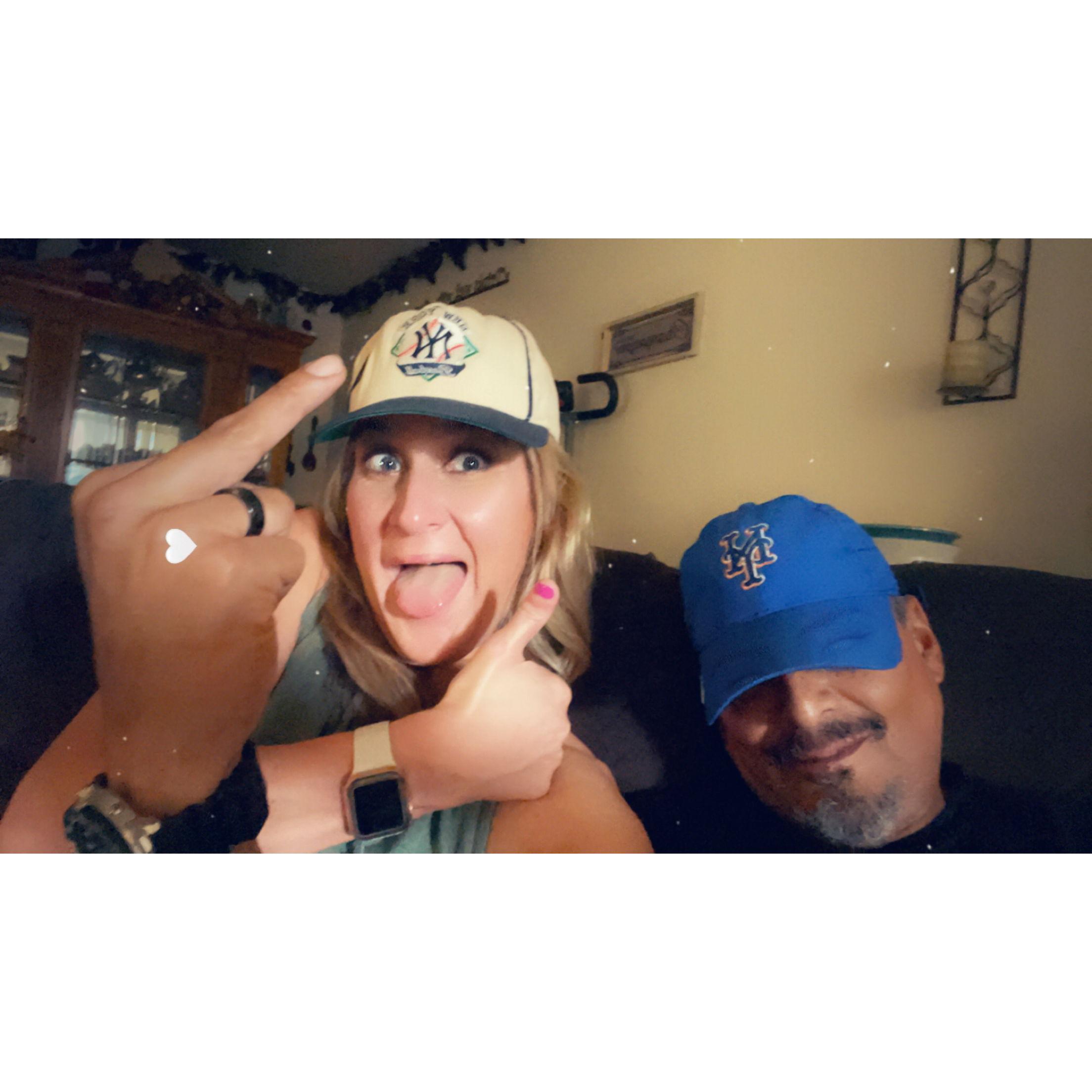 Wearing the very yankee hat I gave her years ago... and a Mets loss :(((